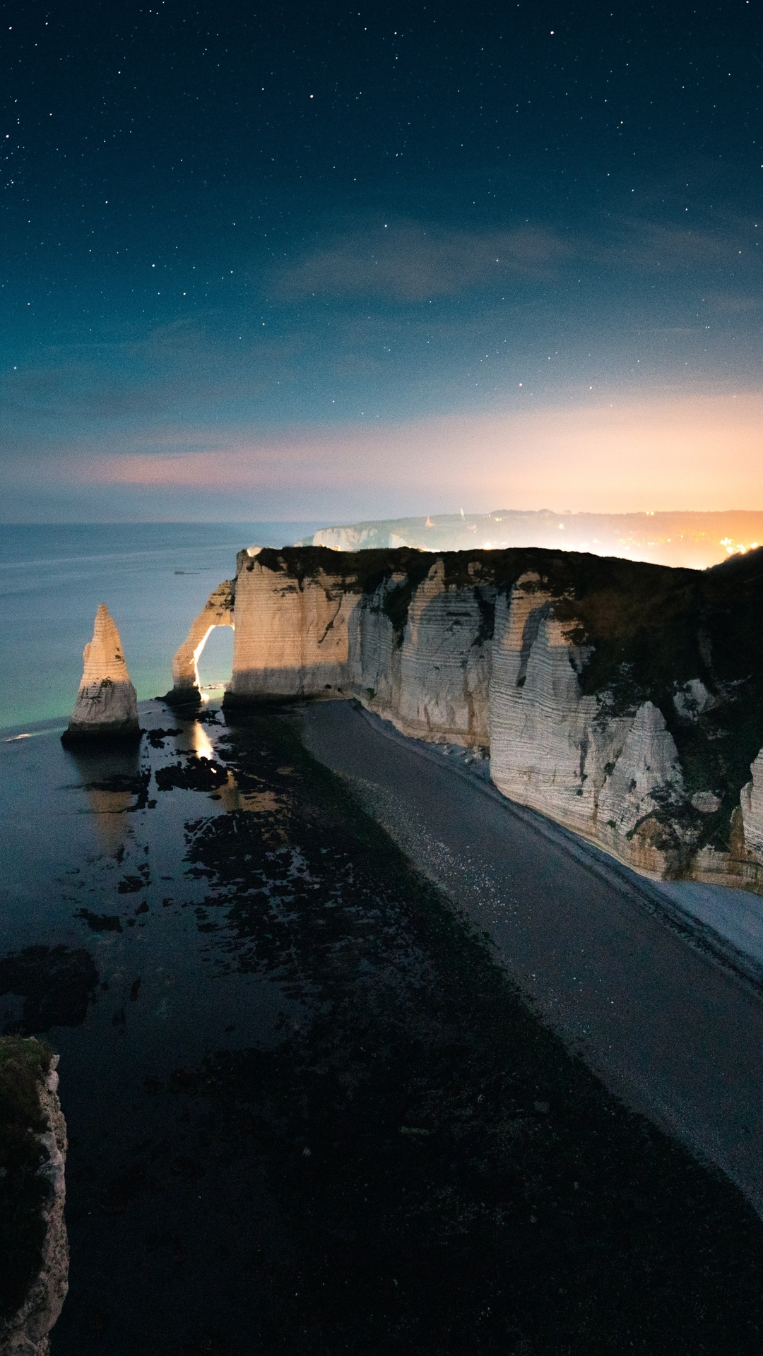 Etretat cliffs at night under a starry sky HD Phone Wallpaper