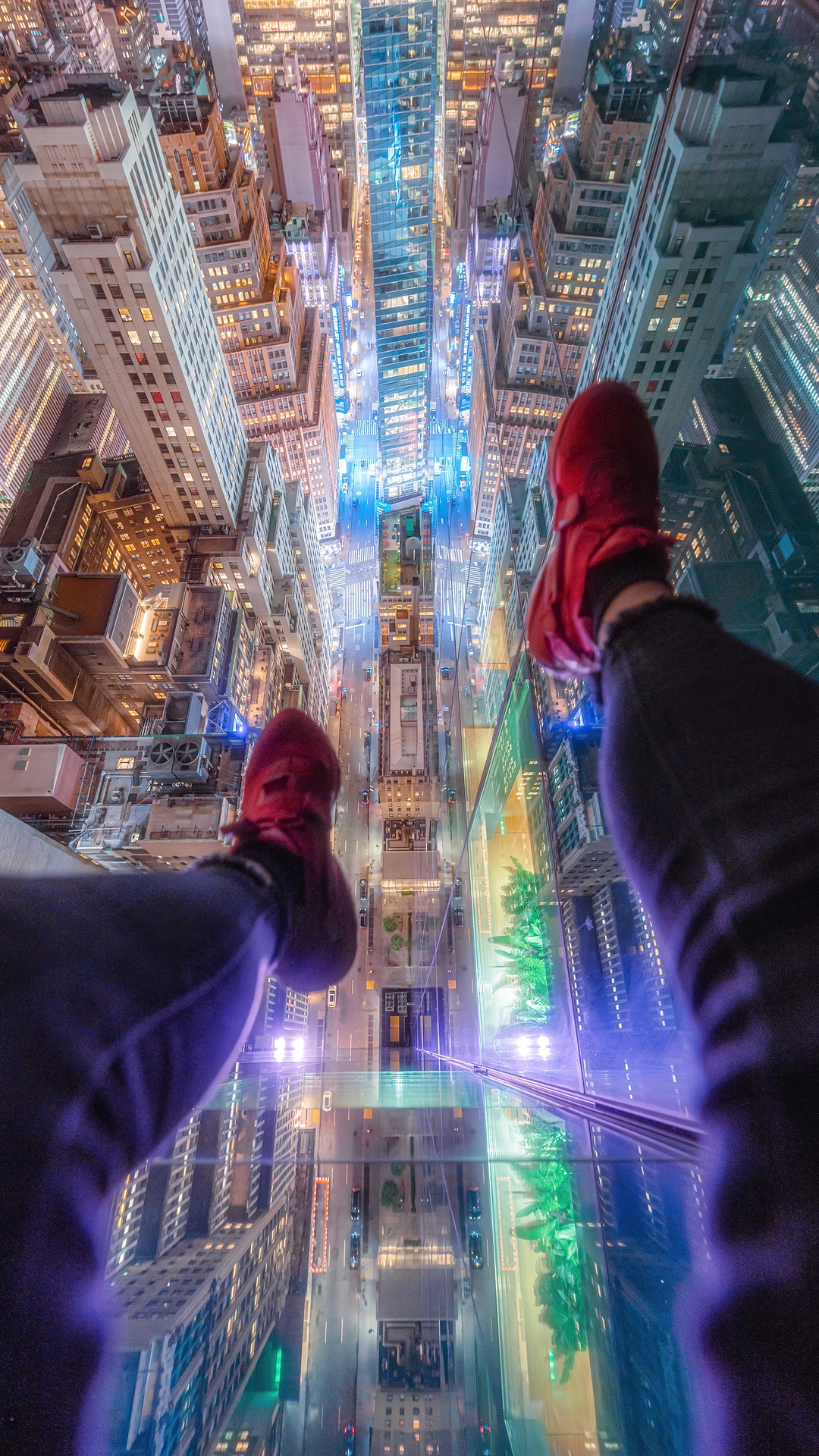 View from a glass floor overlooking a city at night HD Phone Wallpaper