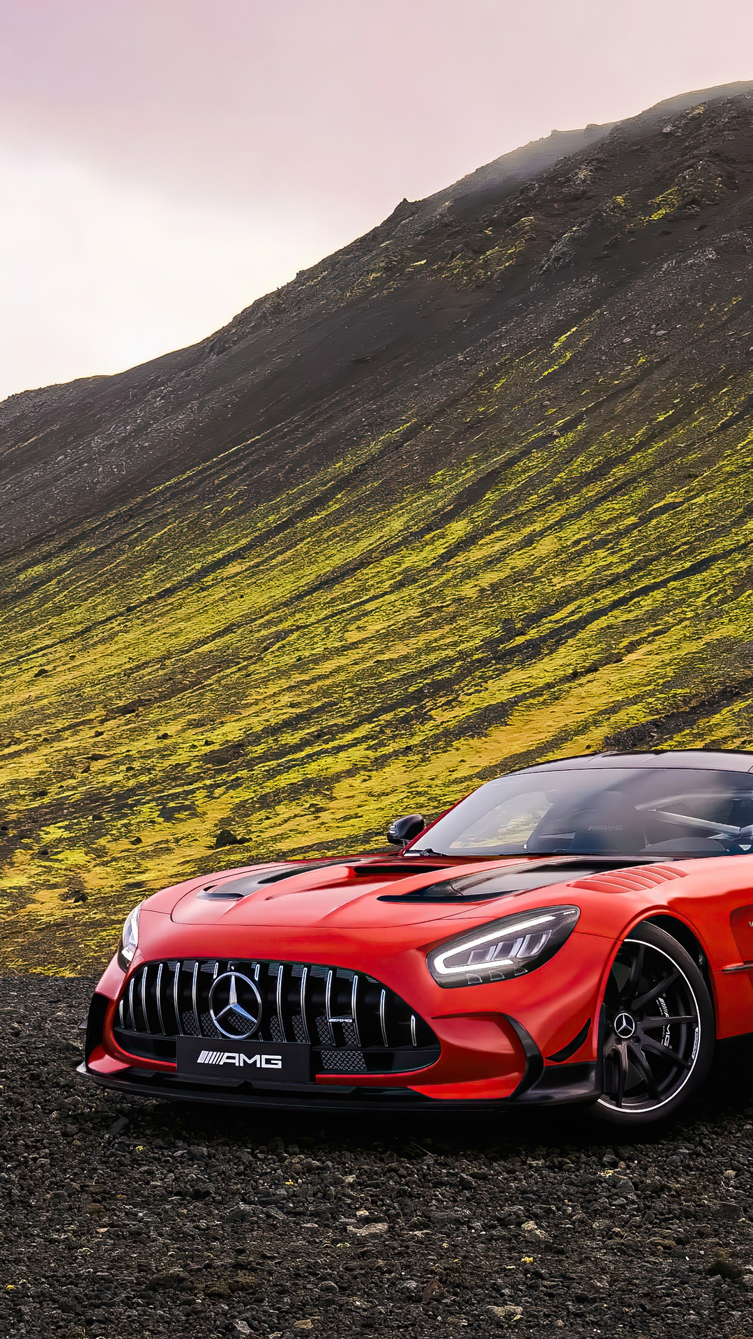 Red Mercedes-AMG GT R on a rocky terrain HD Phone Wallpaper