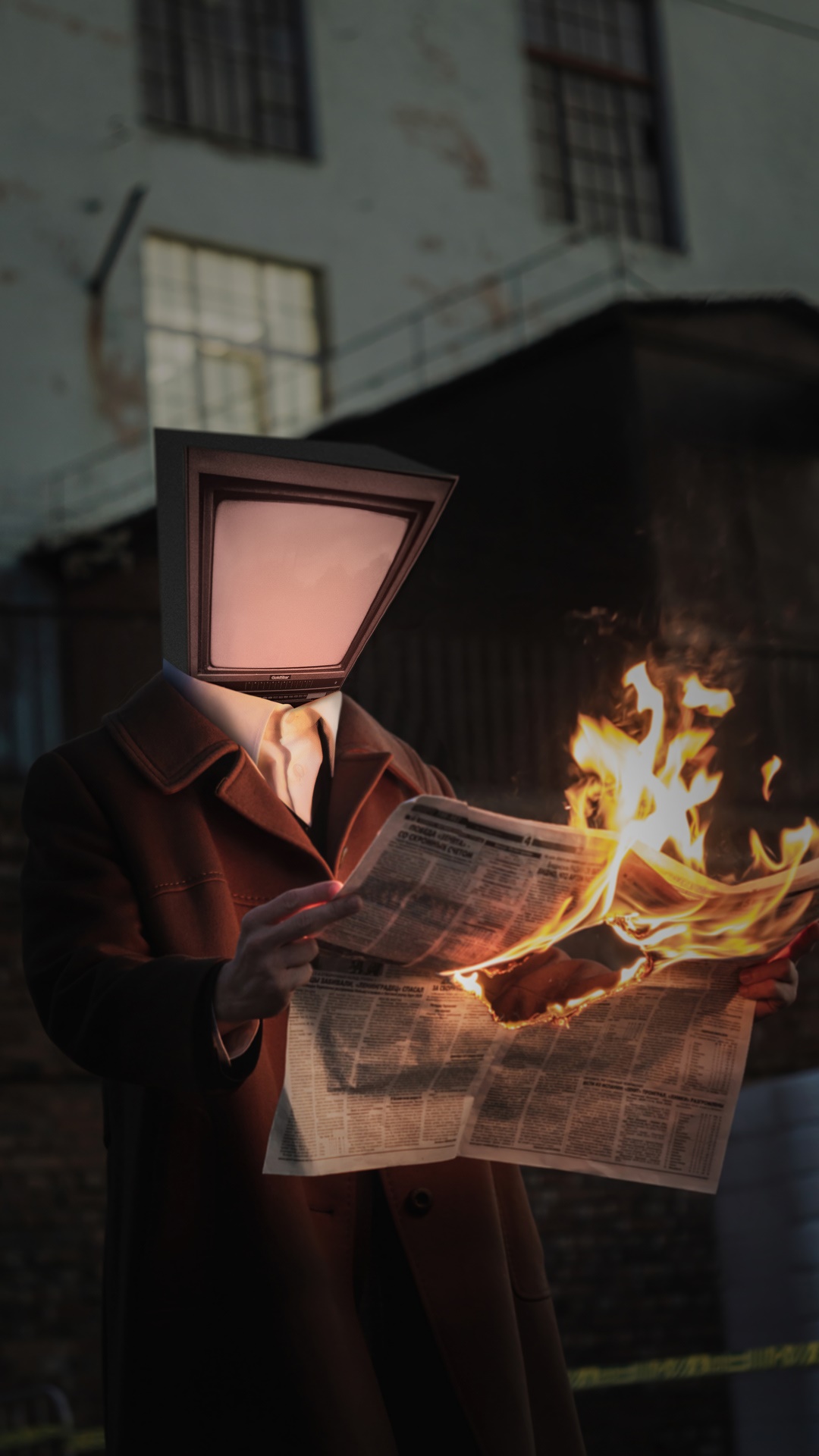Man with TV head reading burning newspaper HD Phone Wallpaper