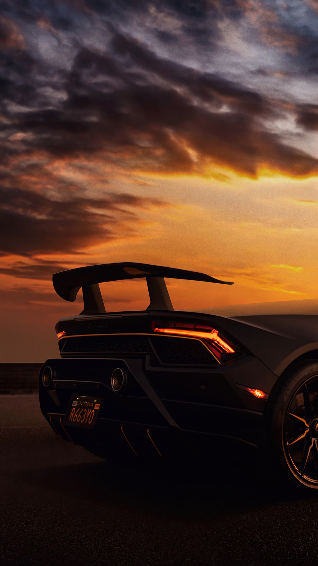 Lamborghini rear view at sunset HD Phone Wallpaper
