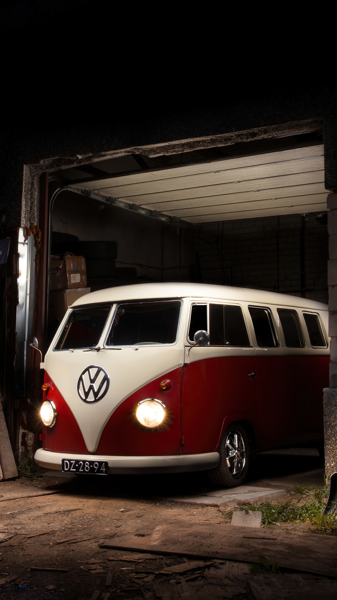 Red and white Volkswagen van in a garage HD Phone Wallpaper