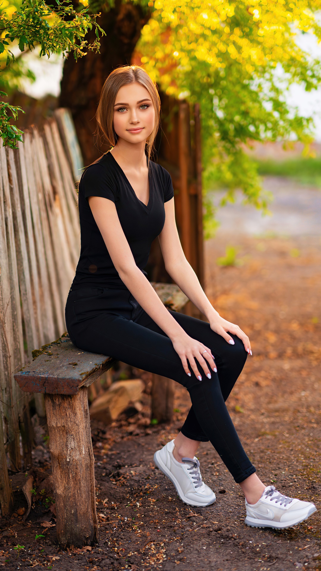 Girl in black sitting on a wooden bench HD Phone Wallpaper
