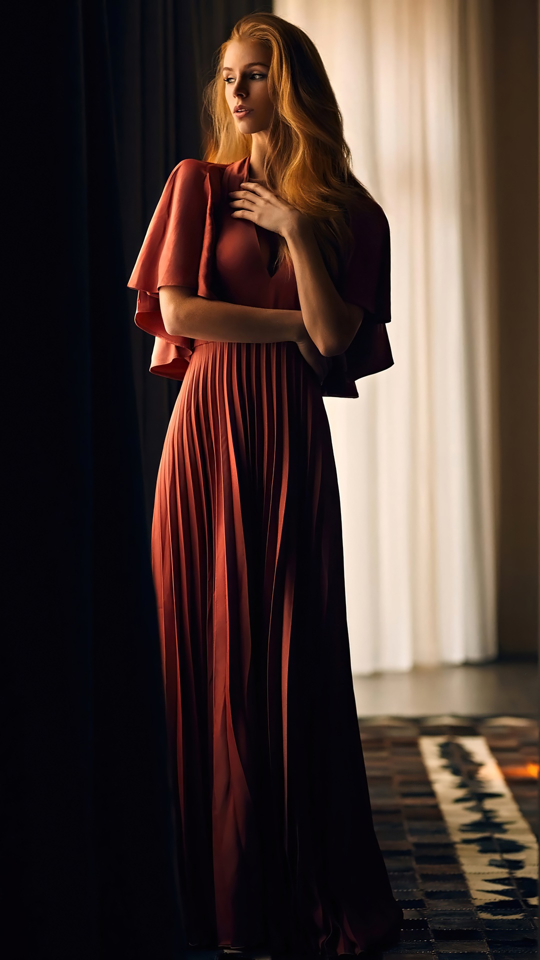 Model in a red pleated dress HD Phone Wallpaper