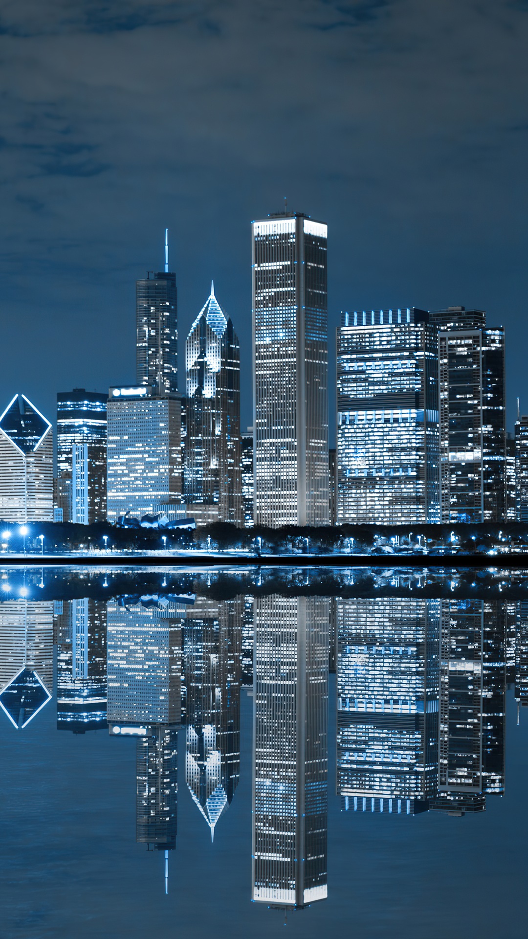 Chicago skyline reflected in water at night HD Phone Wallpaper