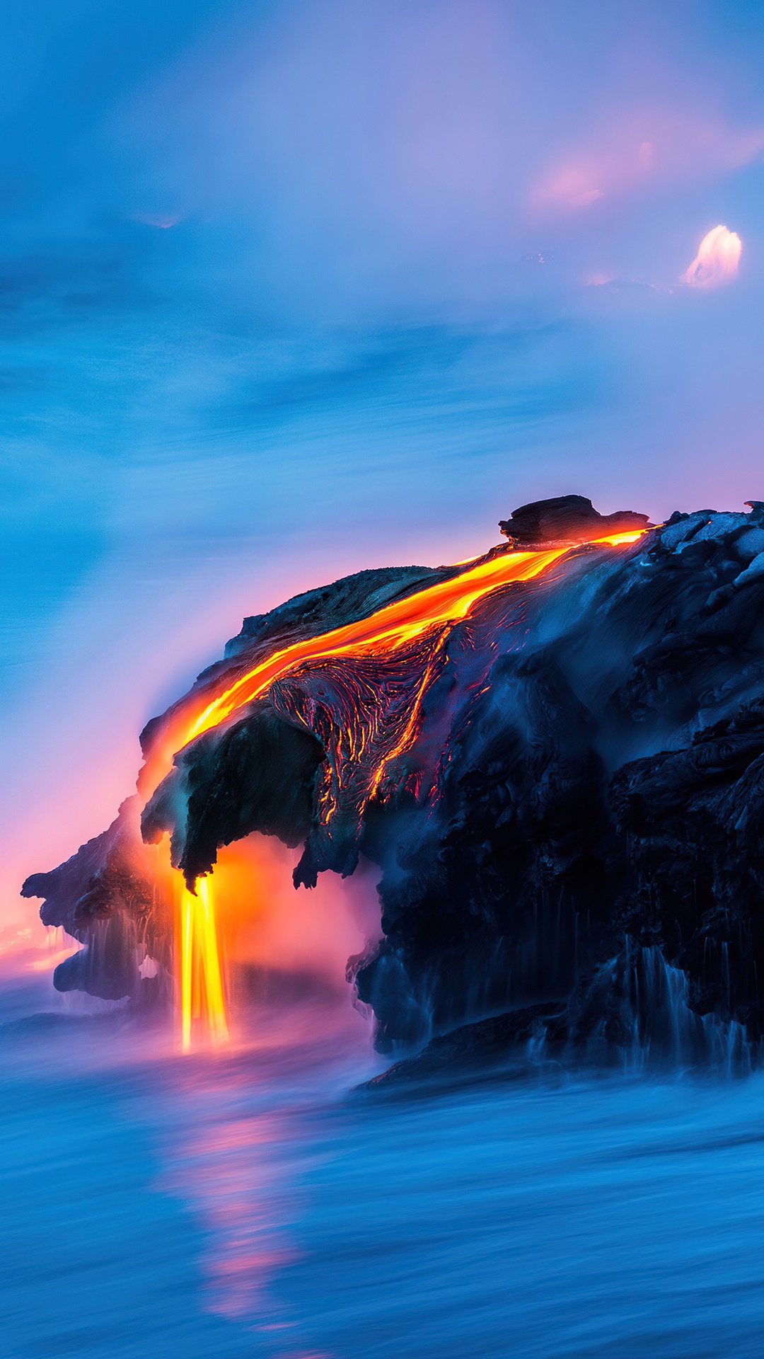 Molten lava flows over dark rocks into the ocean HD Phone Wallpaper
