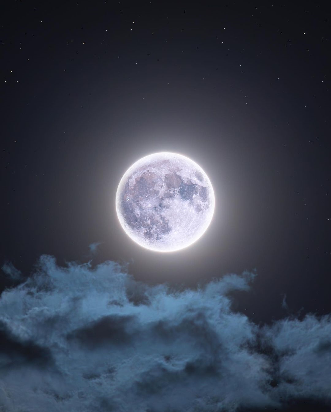 Full moon shining through clouds in a starry night sky HD Phone Wallpaper