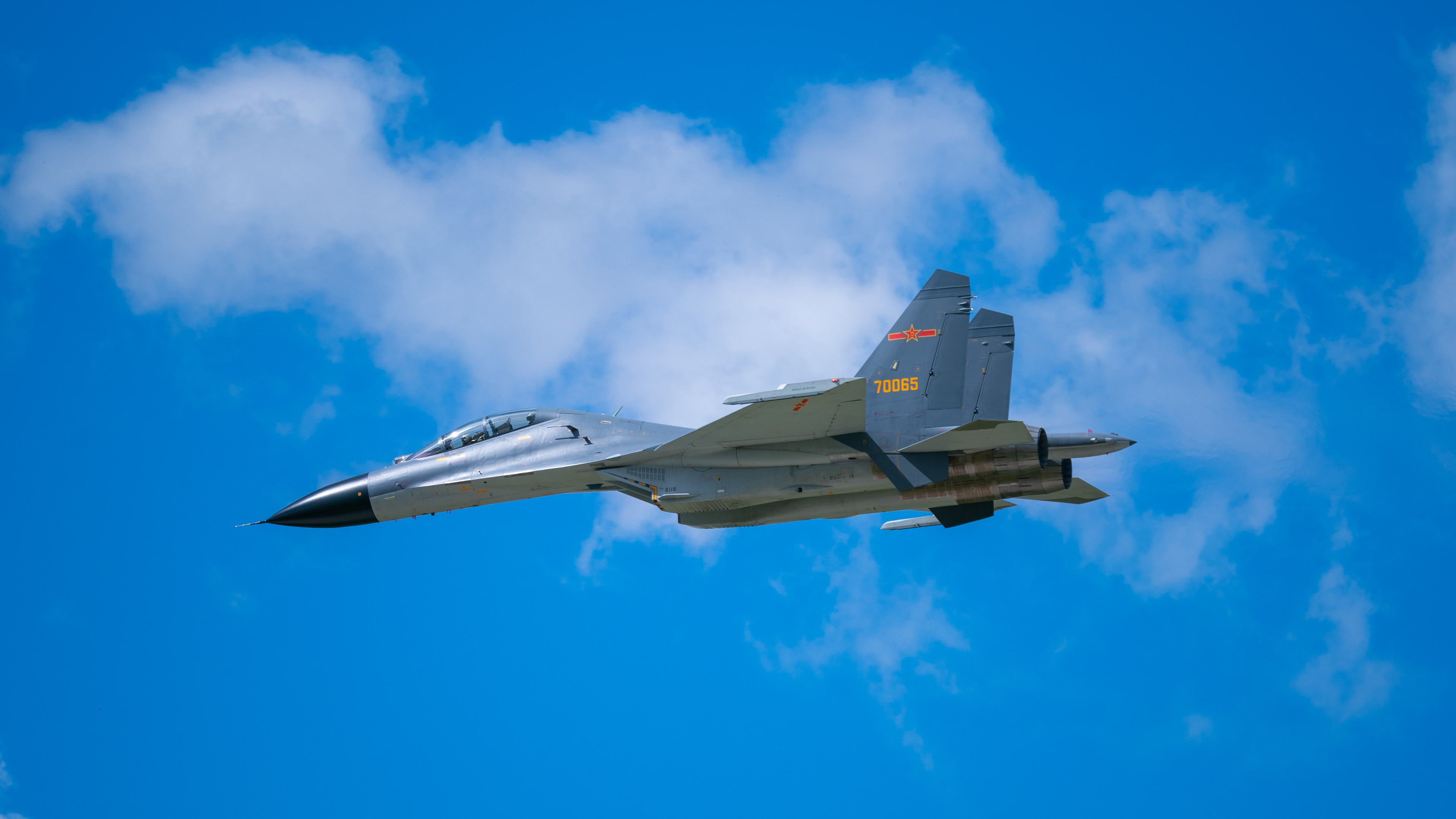 PLAAF fighter jet flying in the sky HD Wallpaper
