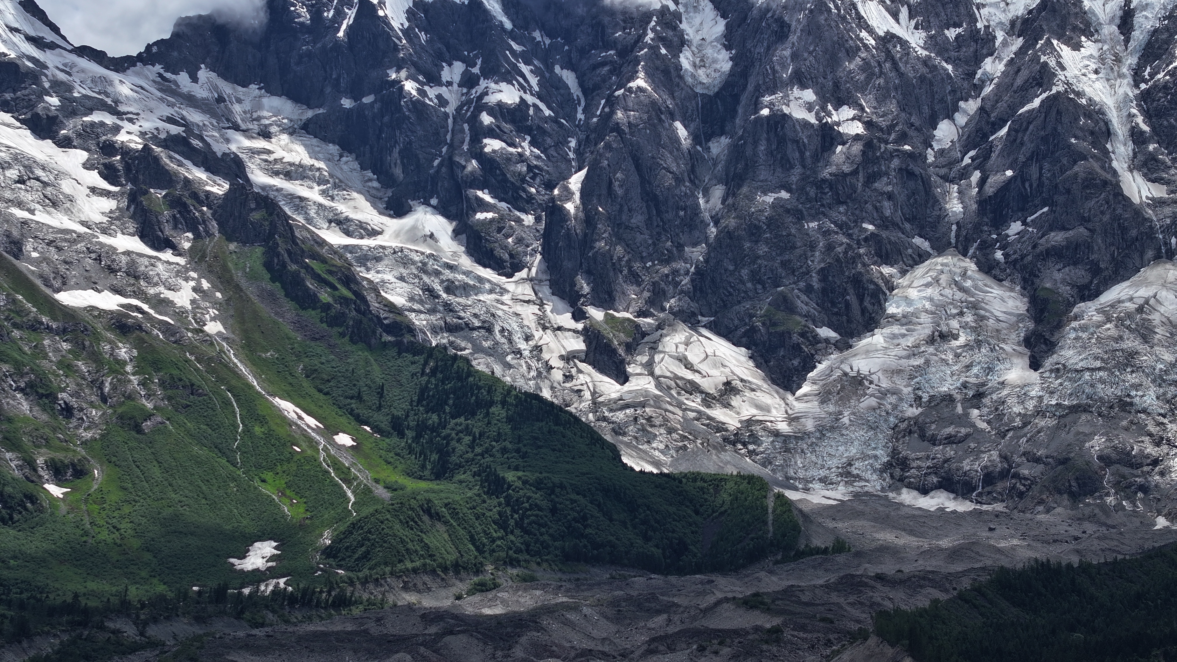 4K snowy mountain landscape with glaciers and trees HD Wallpaper
