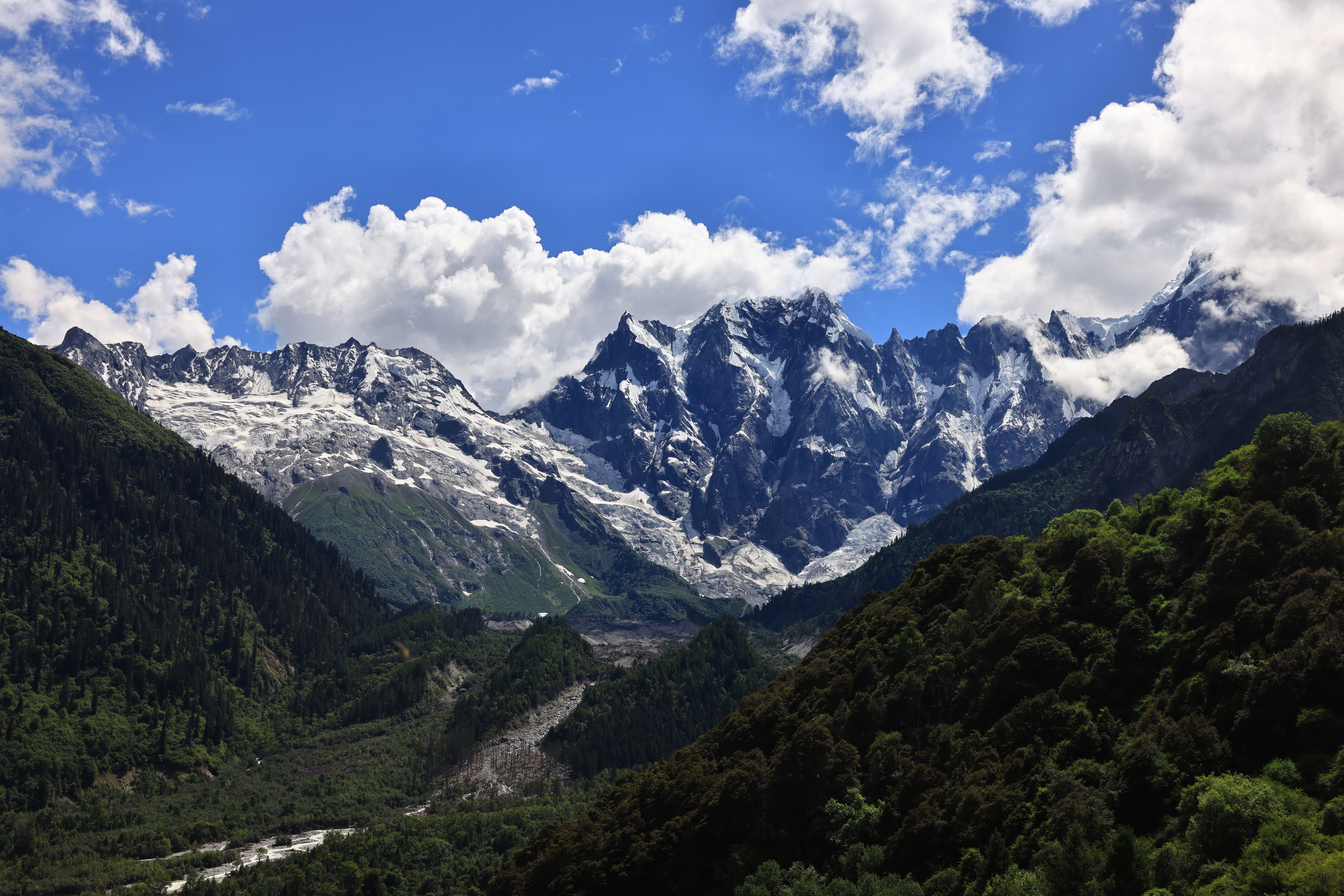 4K snowy mountain landscape with clouds and trees HD Wallpaper