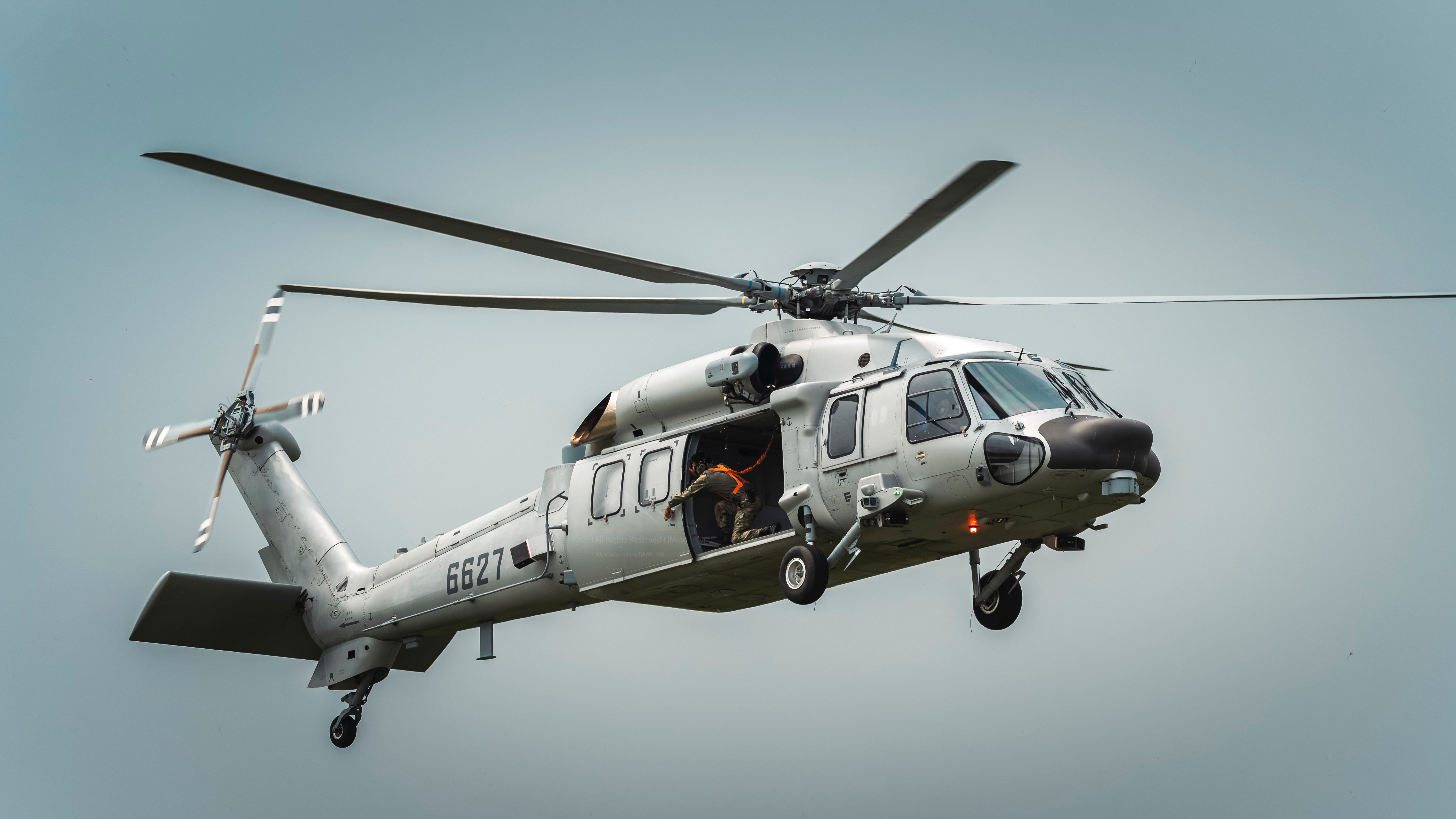 Z-20 military helicopter in flight HD Wallpaper