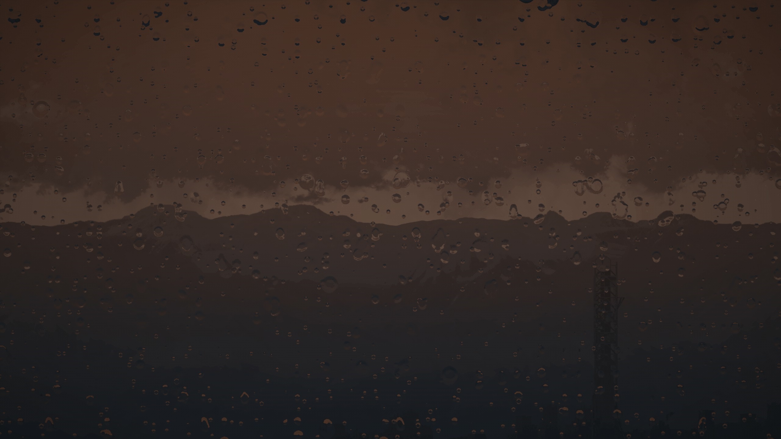 Raindrops on a window overlooking a mountain landscape HD Wallpaper