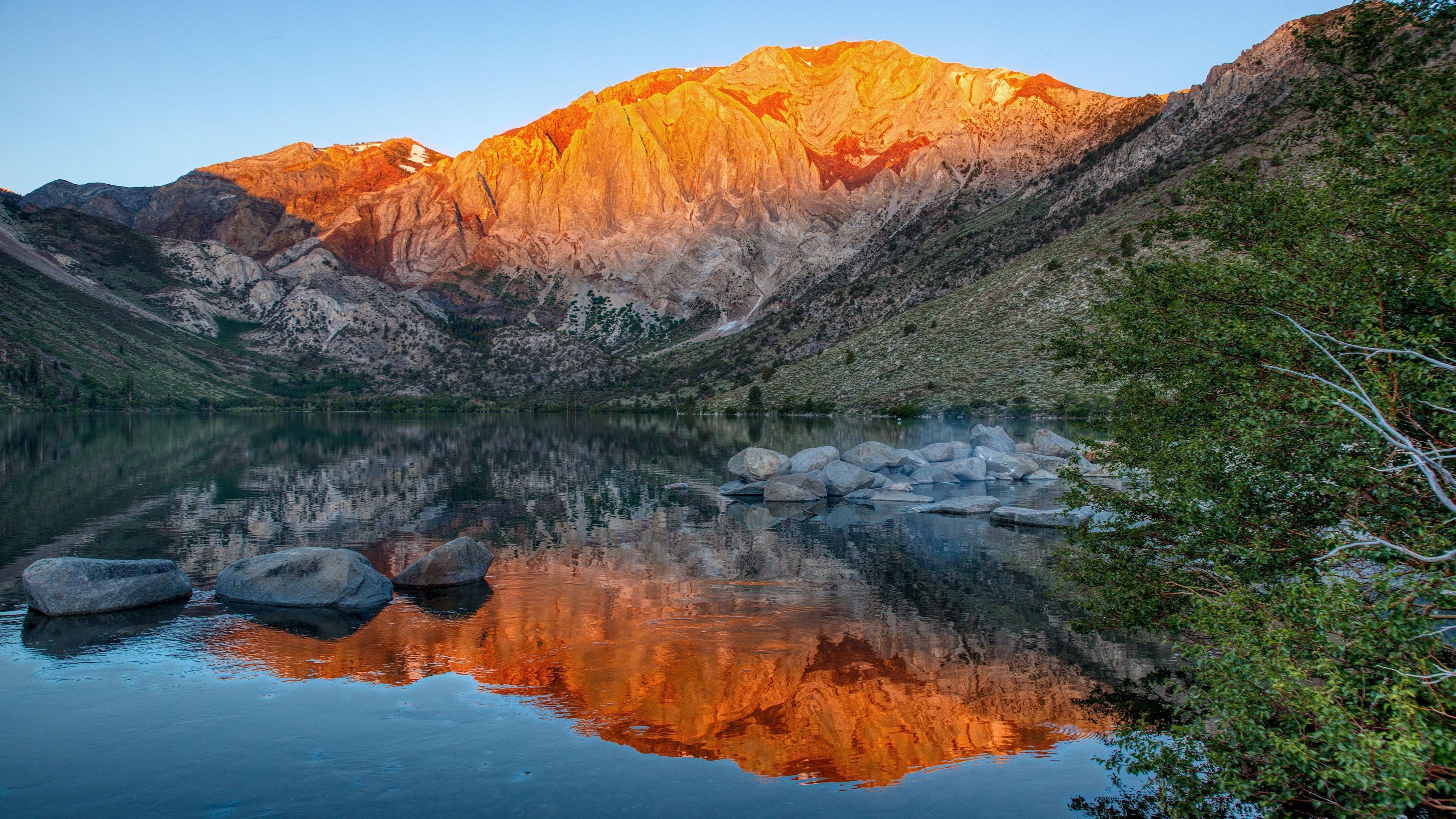 Sunlight on Mountains Reflecting in a Lake HD Wallpaper