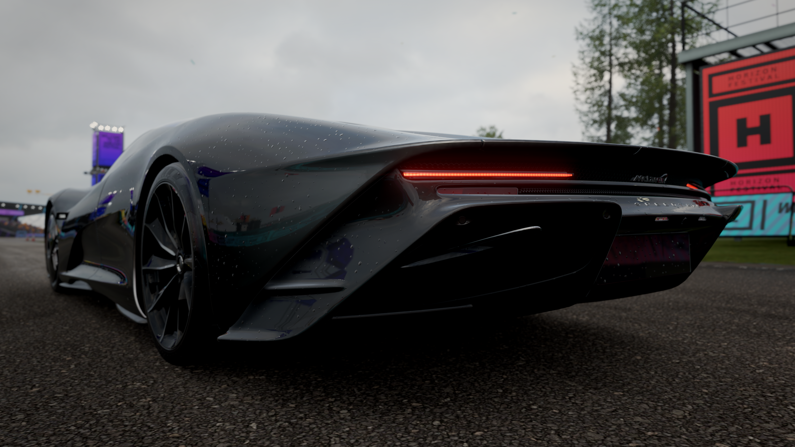 McLaren Speedtail rear view on asphalt HD Wallpaper