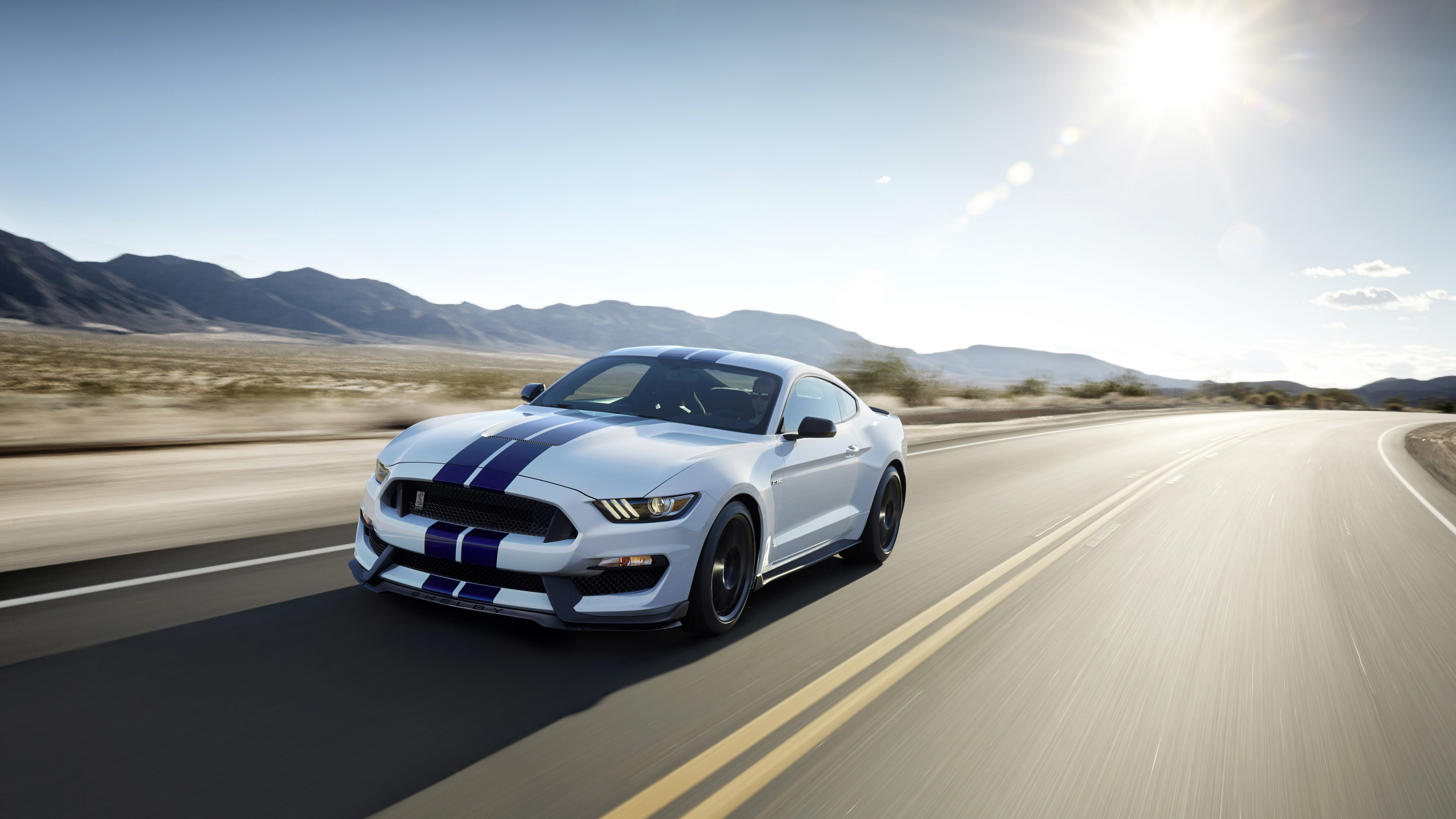 White Ford Mustang Apollo Edition driving on a desert road HD Wallpaper