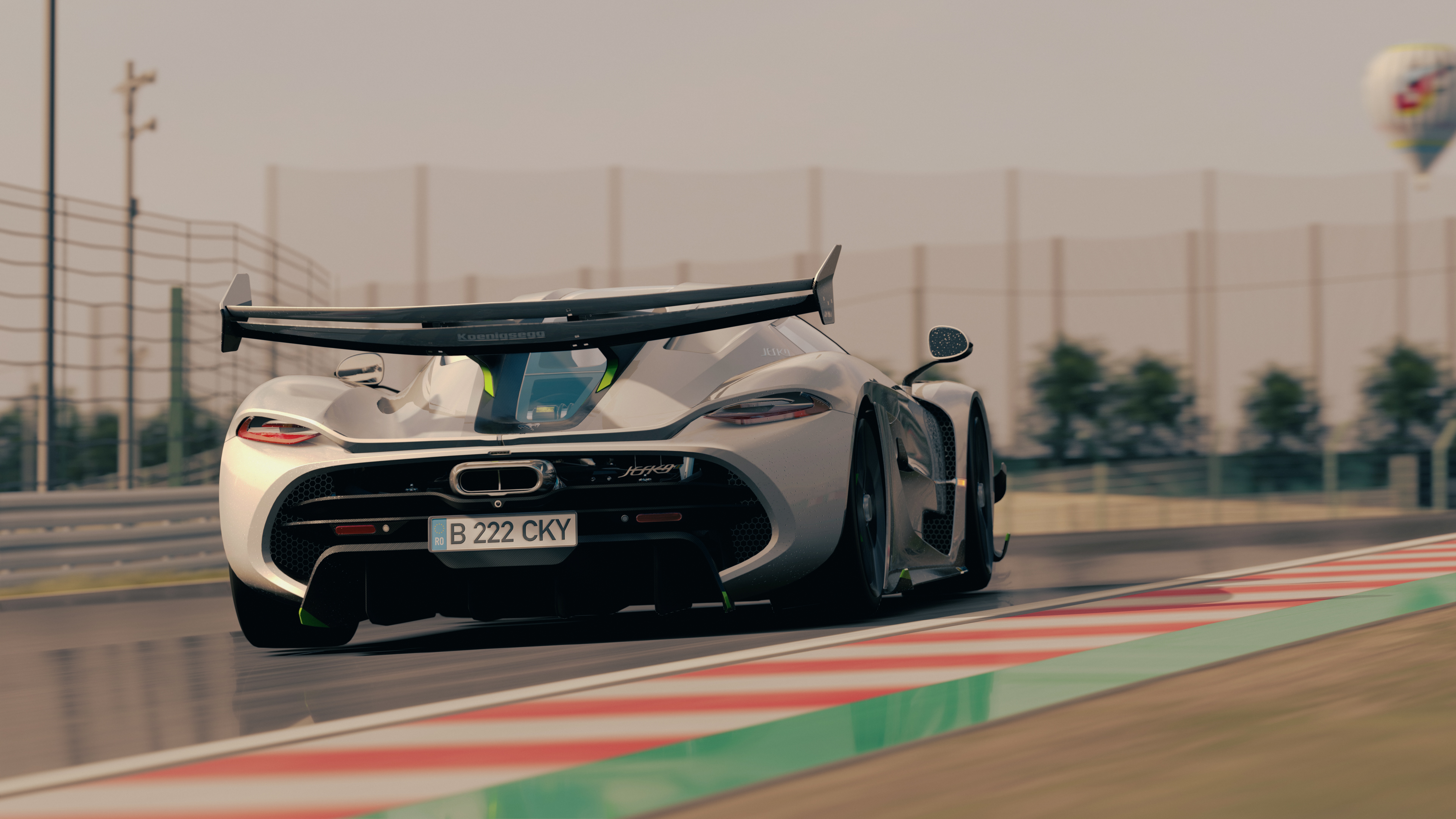 Koenigsegg Jesko on a race track HD Wallpaper