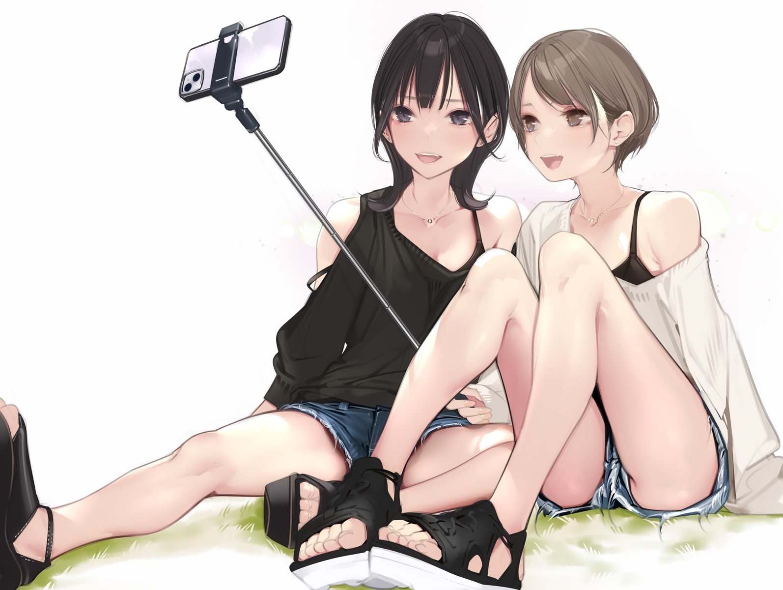 Two girls taking a selfie with a selfie stick HD Wallpaper