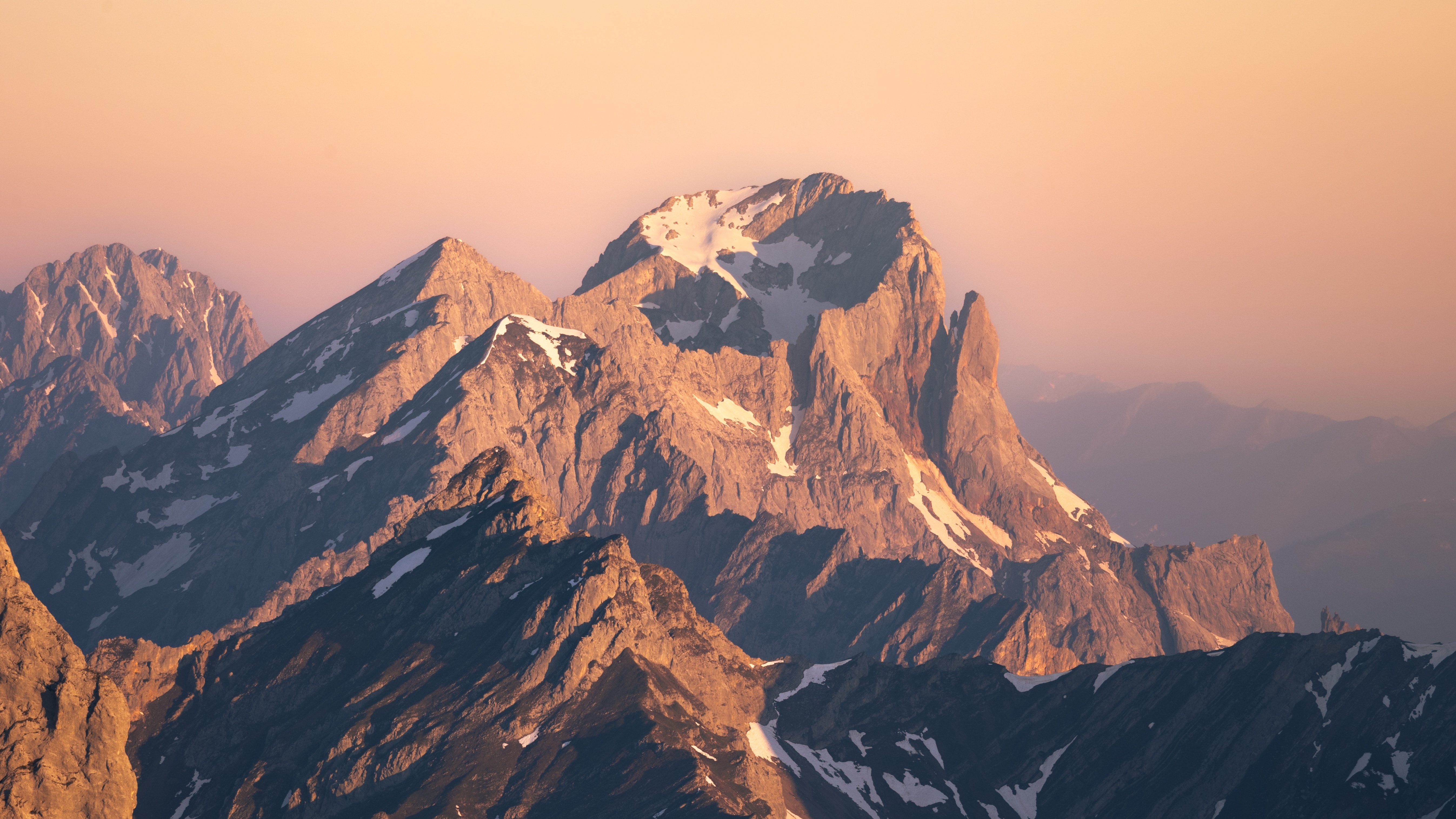 Mountains with snow at sunset HD Wallpaper