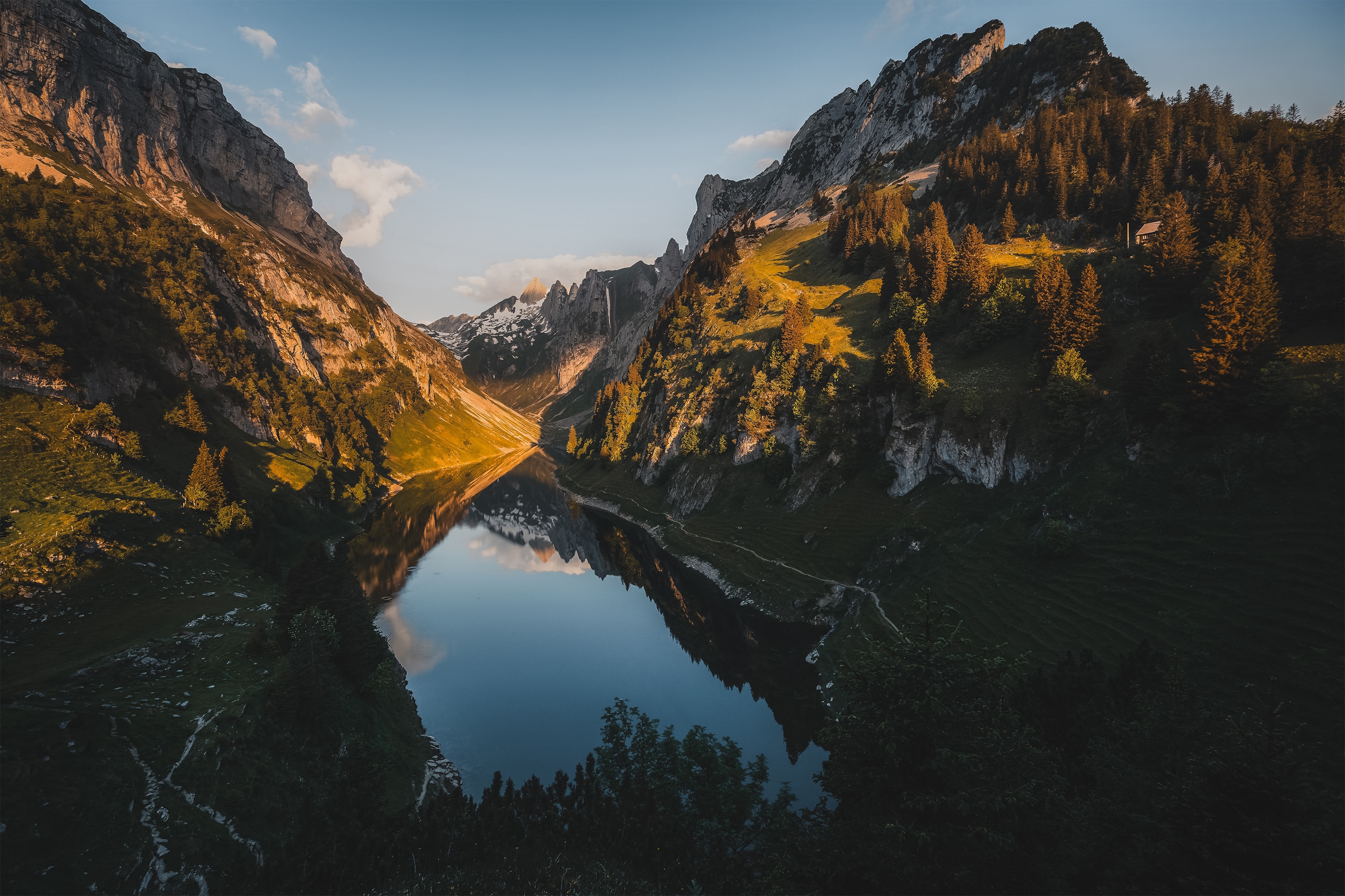 Mountain lake reflection at sunset with forest and waterfall HD Wallpaper
