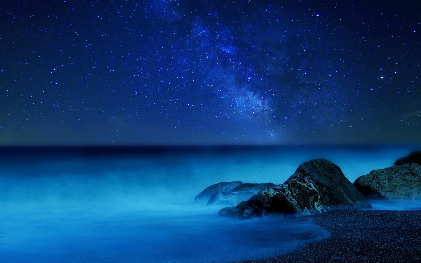 Milky Way over the ocean at night HD Wallpaper