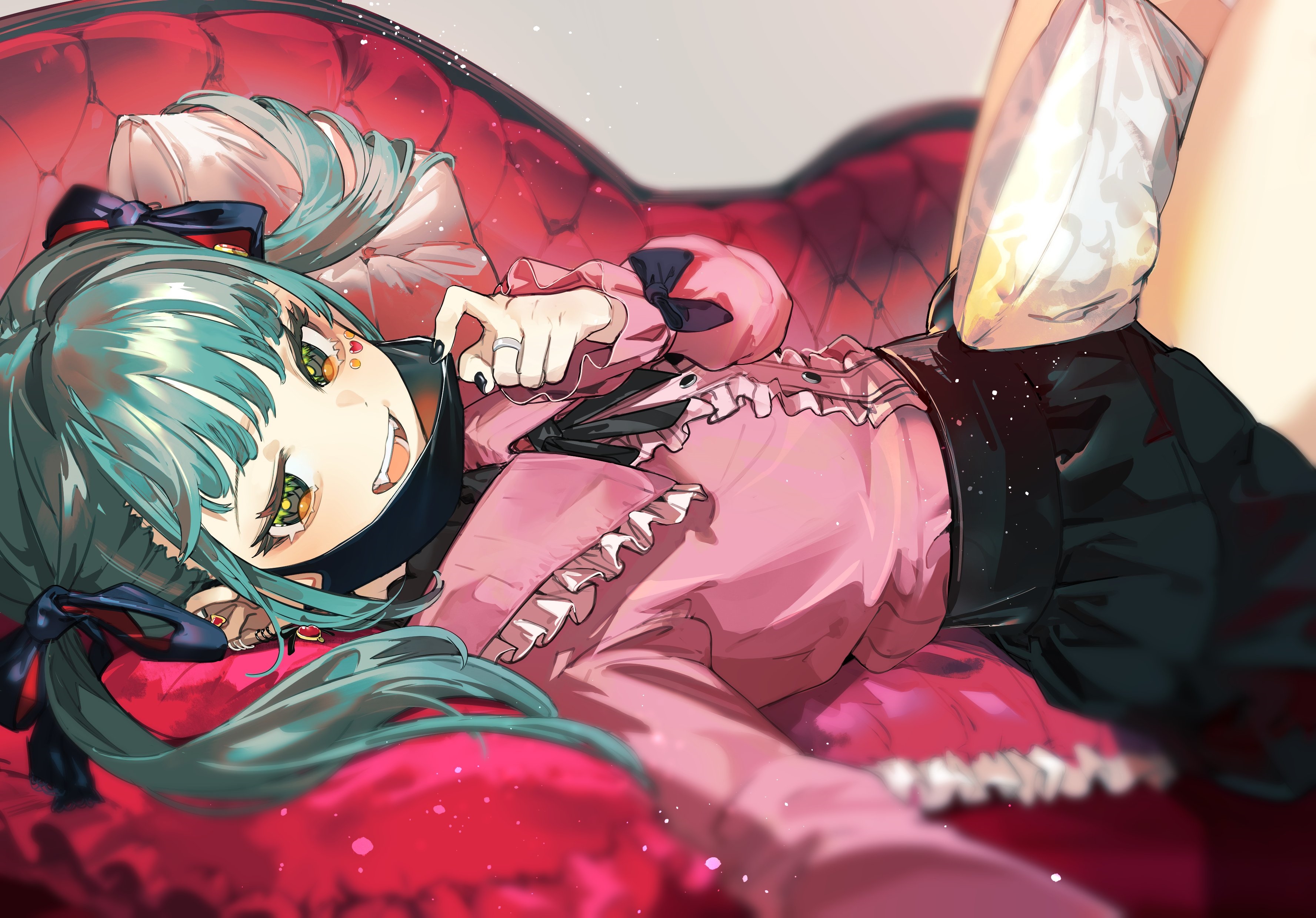 Hatsune Miku with fangs lying on a red couch HD Wallpaper