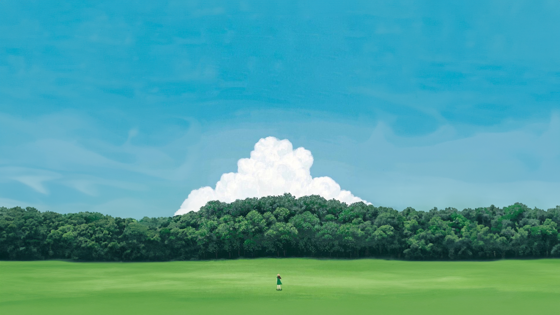 A lone figure stands in a grassy field before a forest HD Wallpaper
