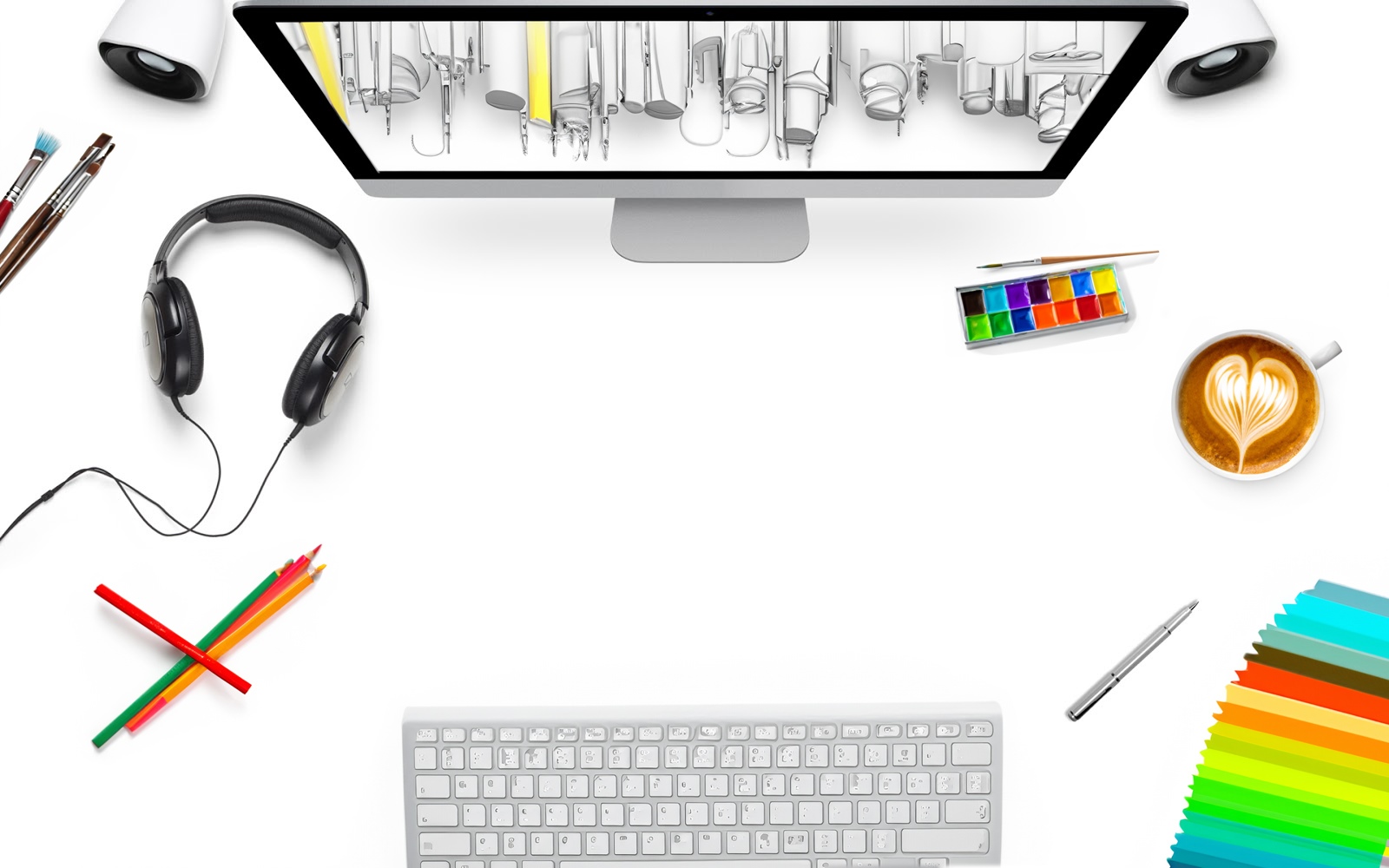 Designer's desk with computer, headphones, and art supplies HD Wallpaper