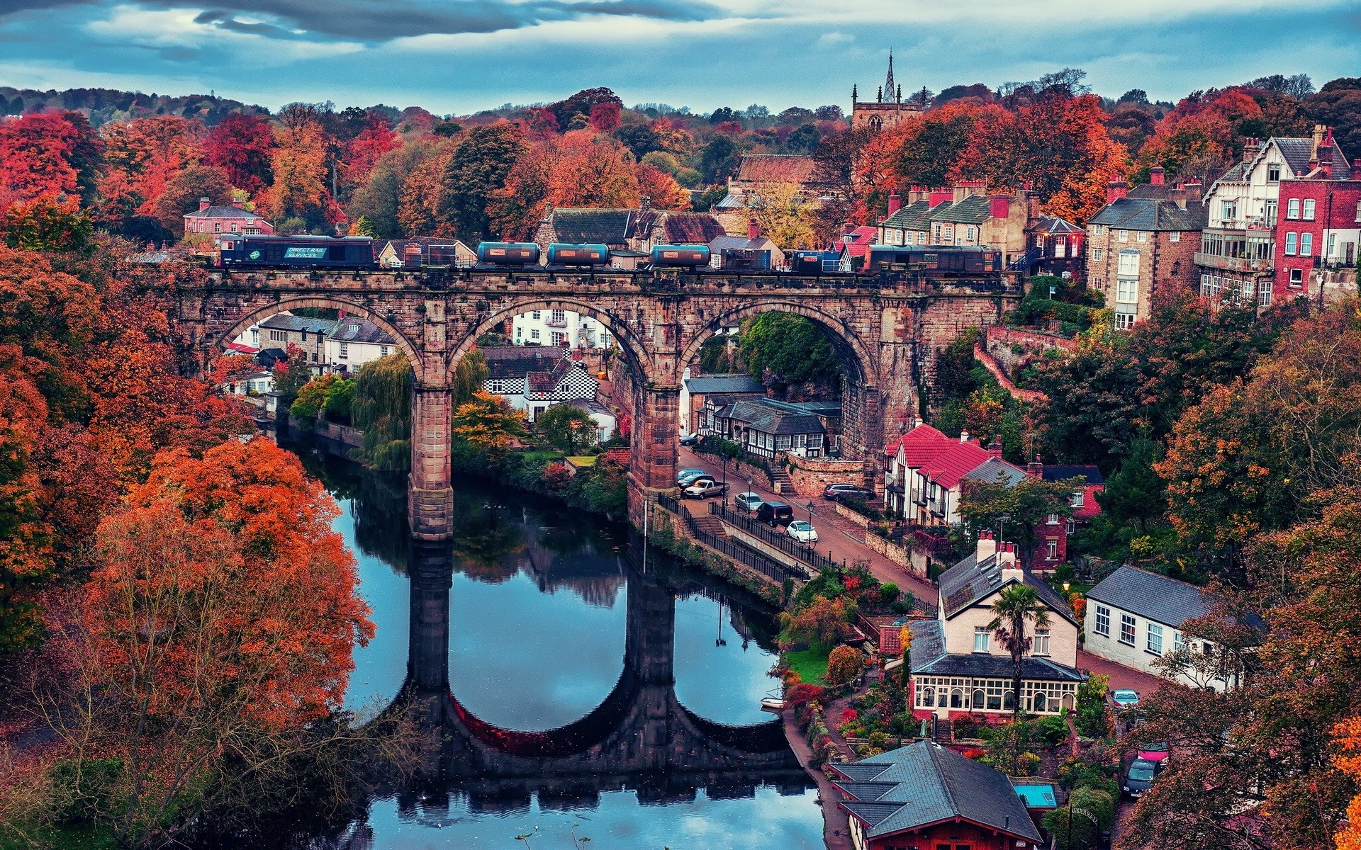 Train crossing Knaresborough Viaduct over River Nidd in autumn HD Wallpaper