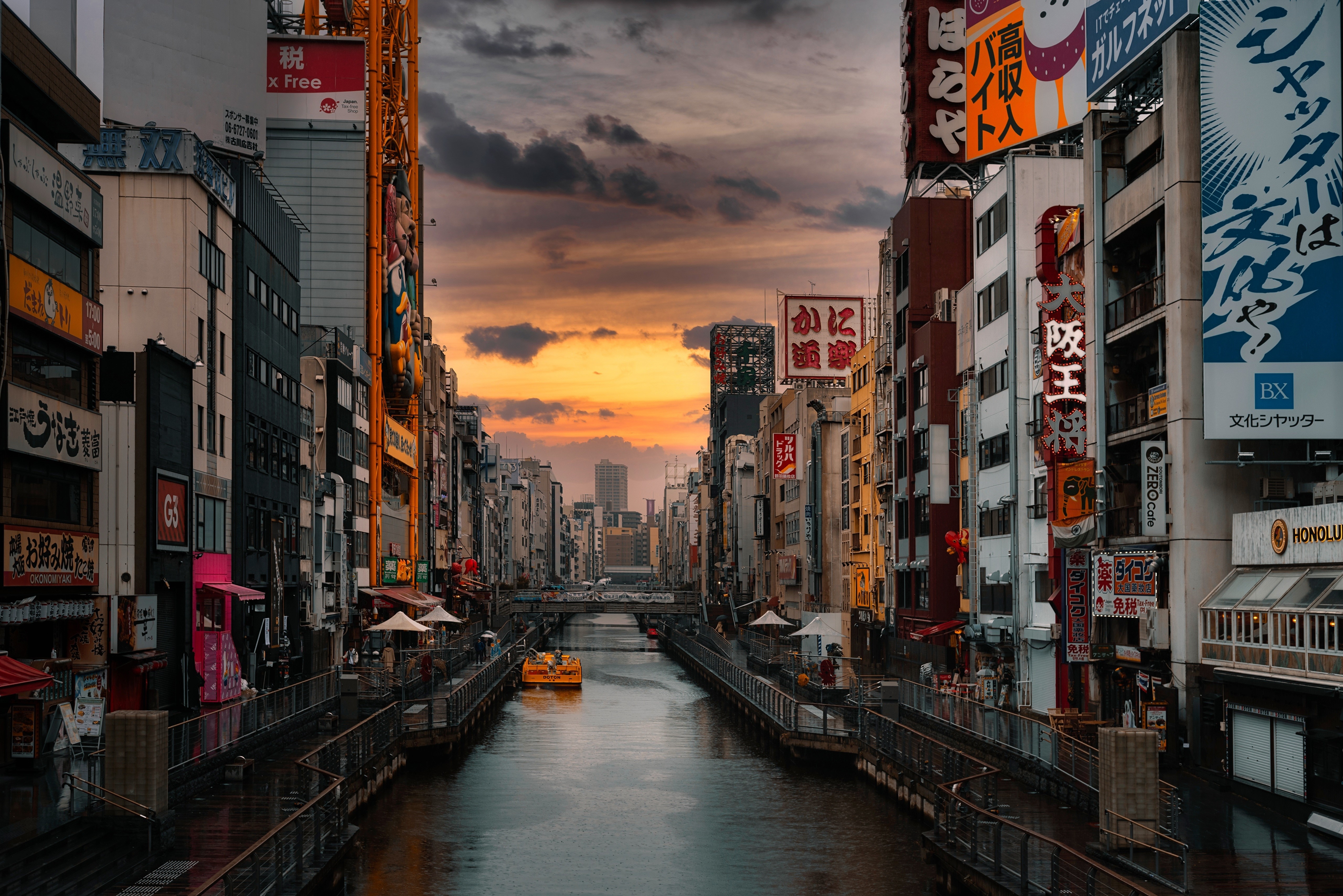 Osaka canal at sunset with neon signs HD Wallpaper