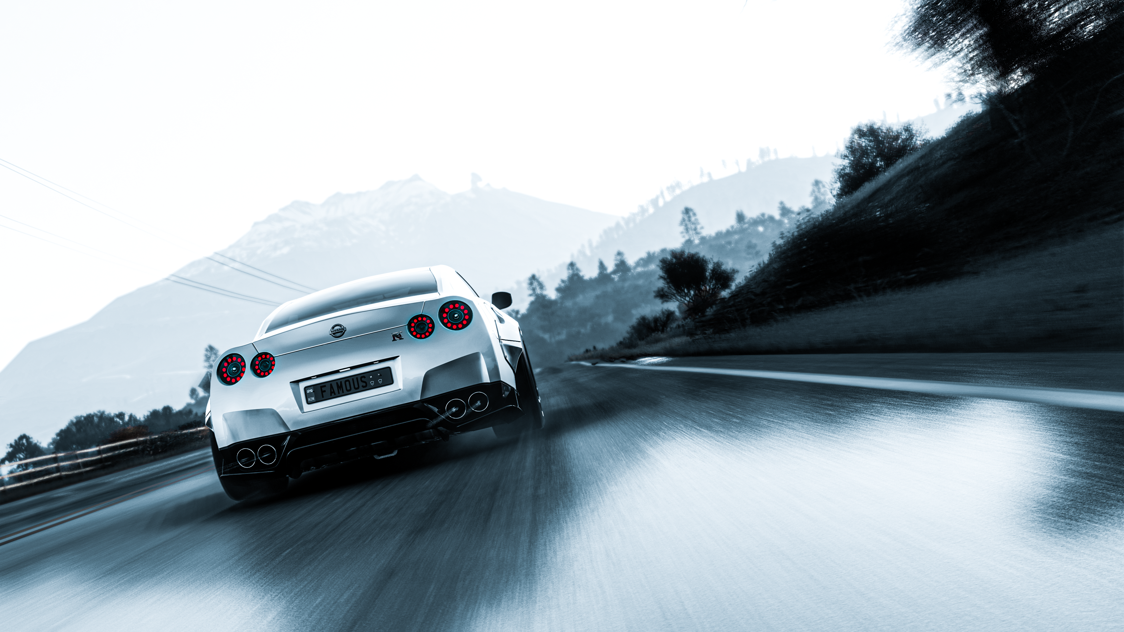 4K Nissan GT-R on a mountain road HD Wallpaper