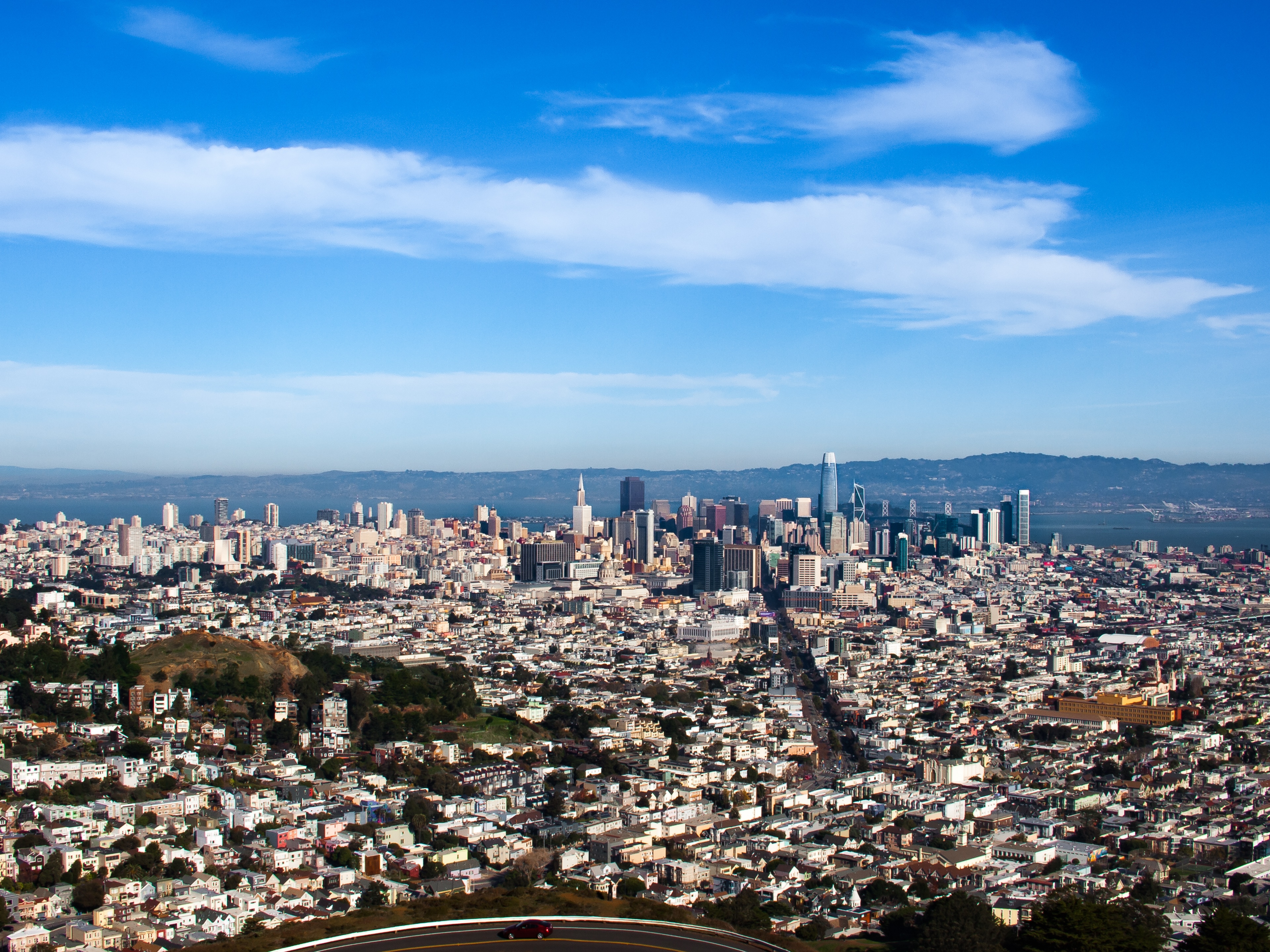 4K San Francisco cityscape with skyscrapers and clouds HD Wallpaper