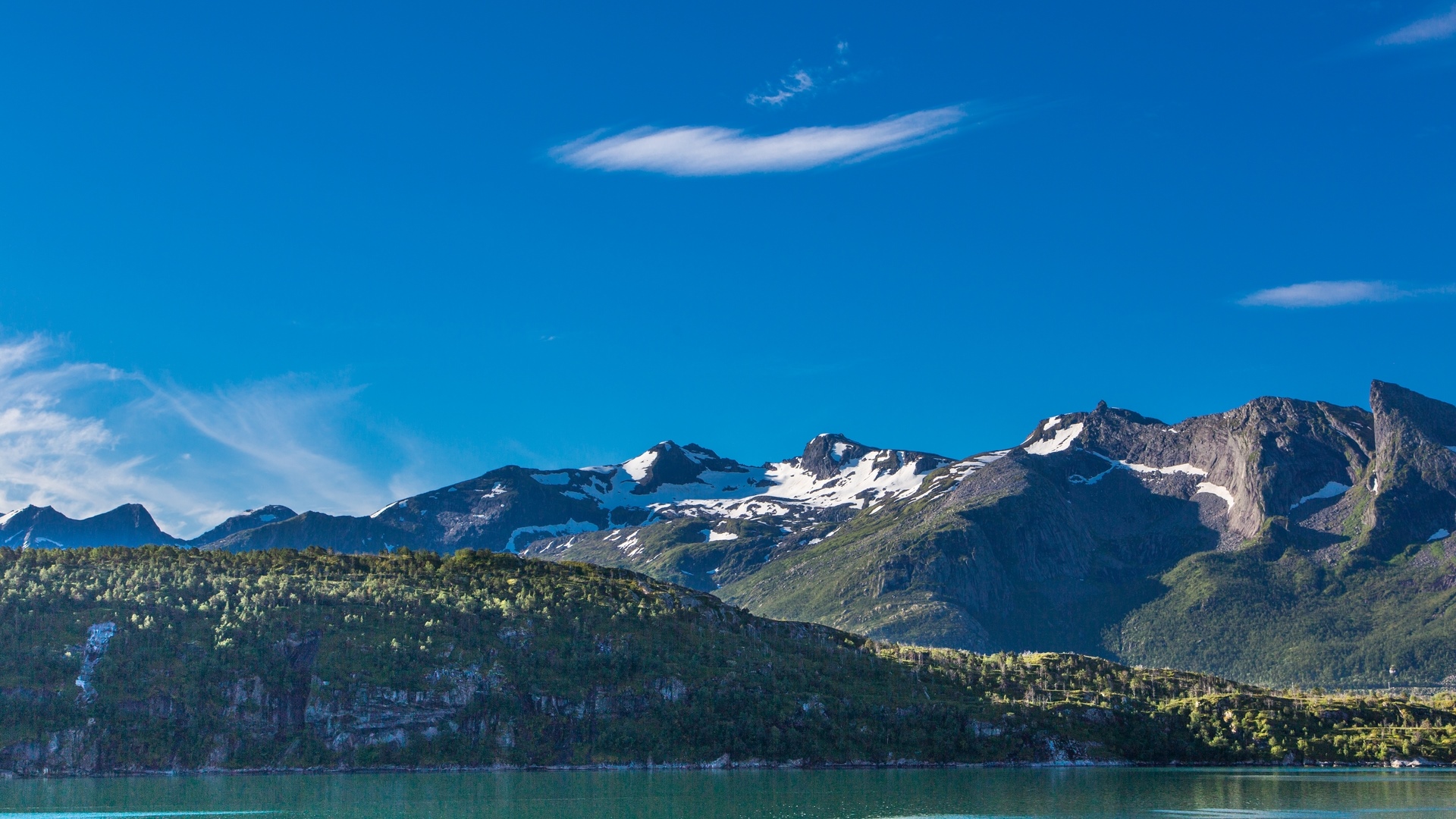 Snow-capped mountains over a fjord in Norway HD Wallpaper