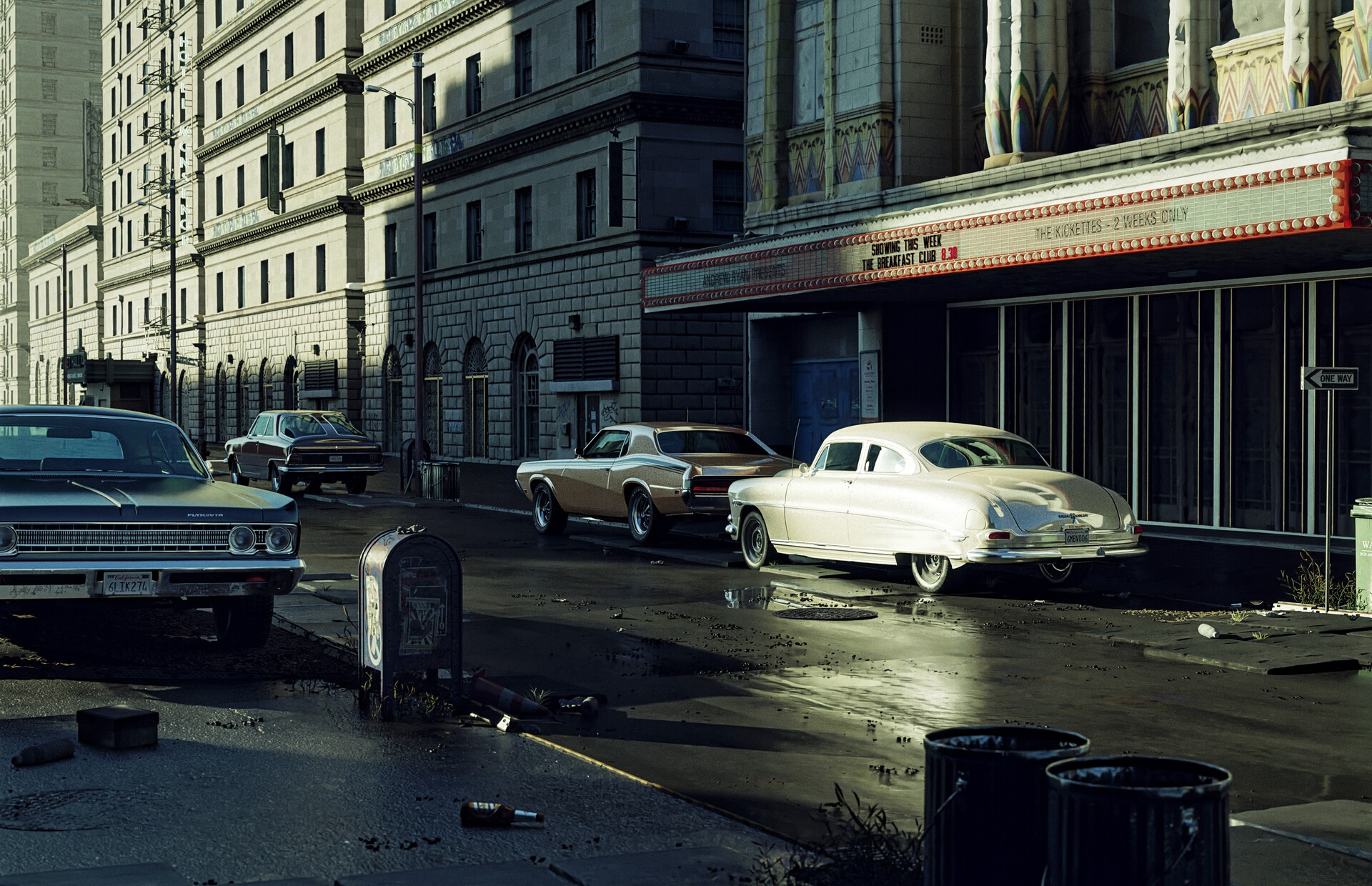 Vintage cars parked on a city street in front of a theater HD Wallpaper