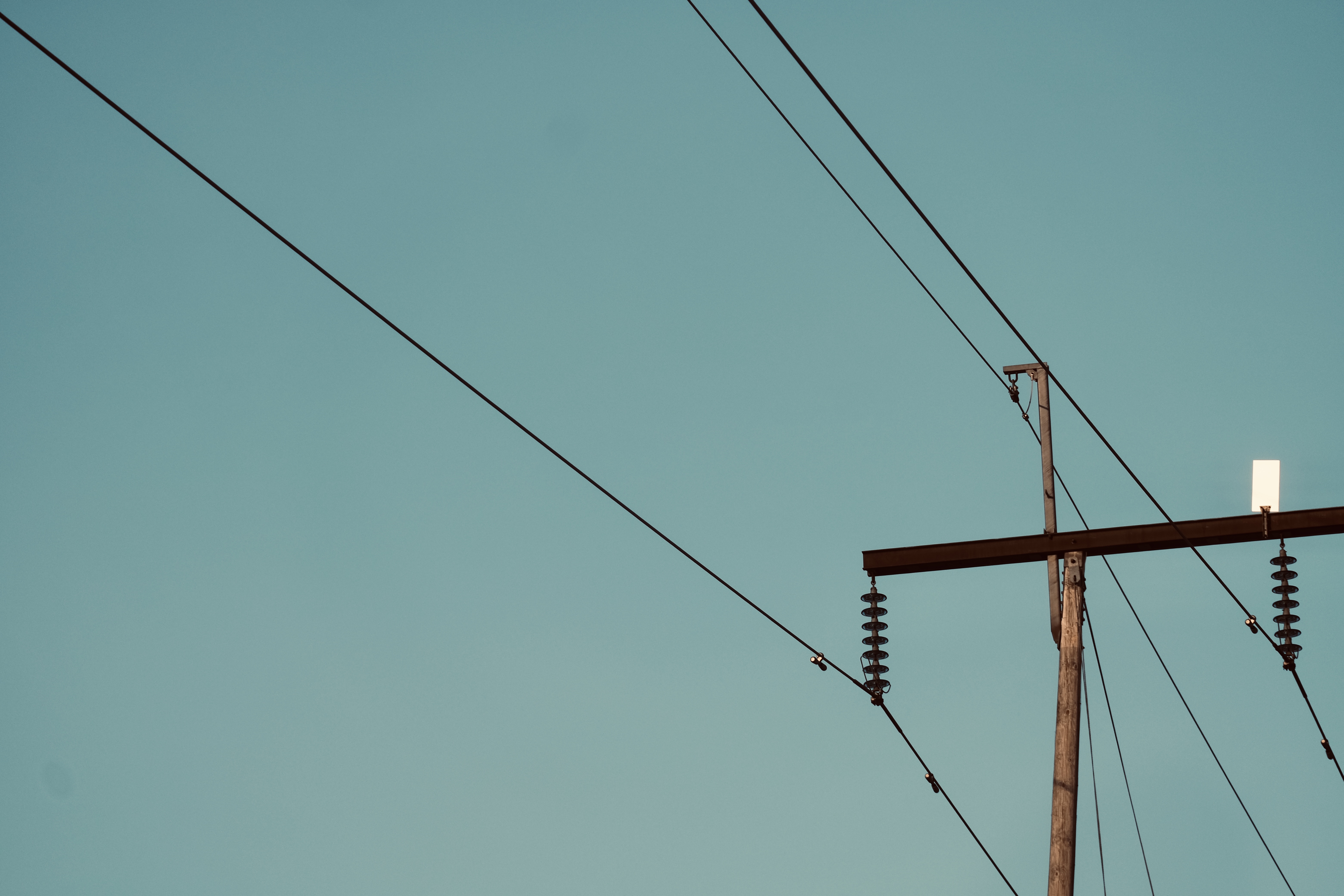 4K power lines against a clear sky HD Wallpaper