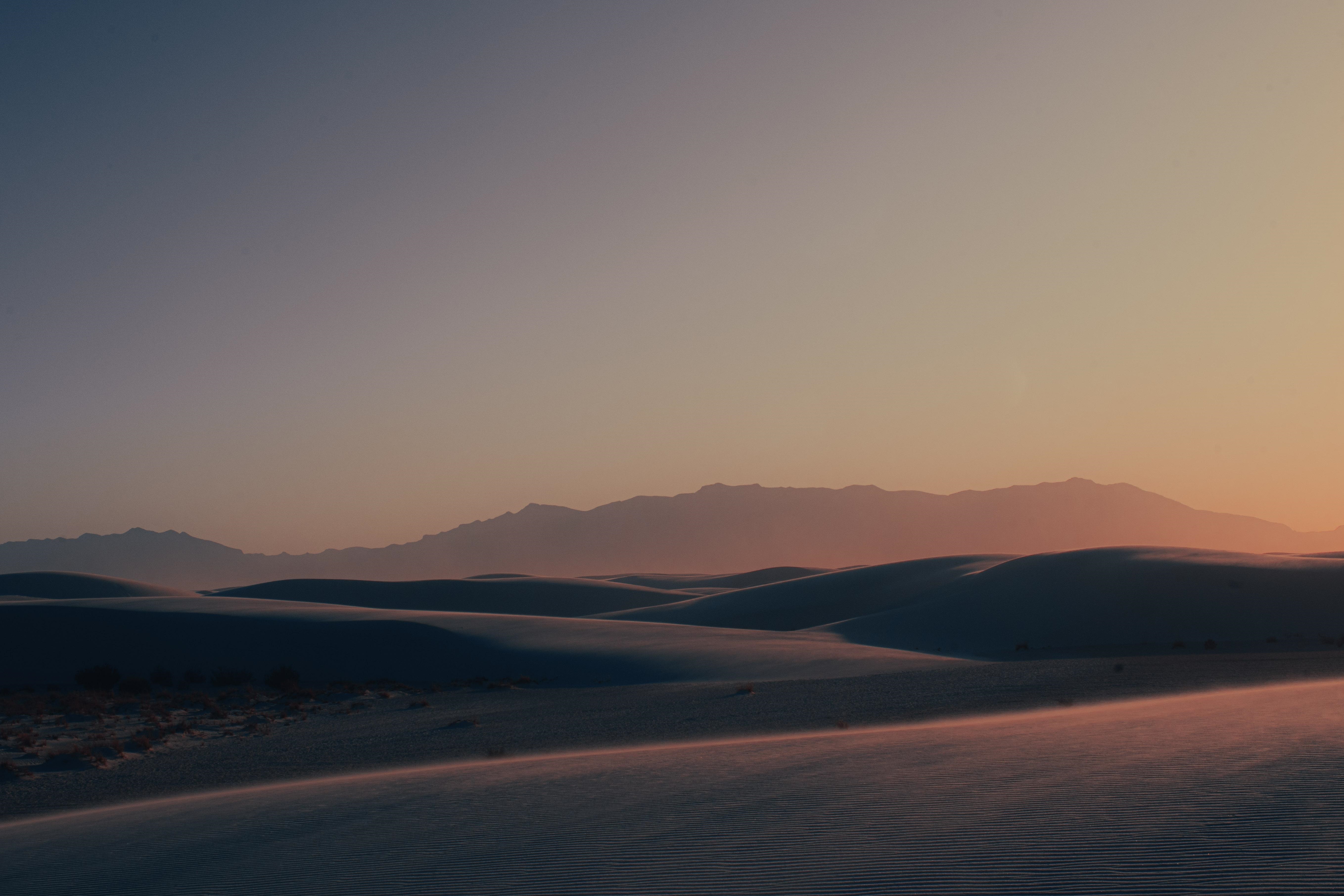 4K desert dunes and mountains at sunset HD Wallpaper