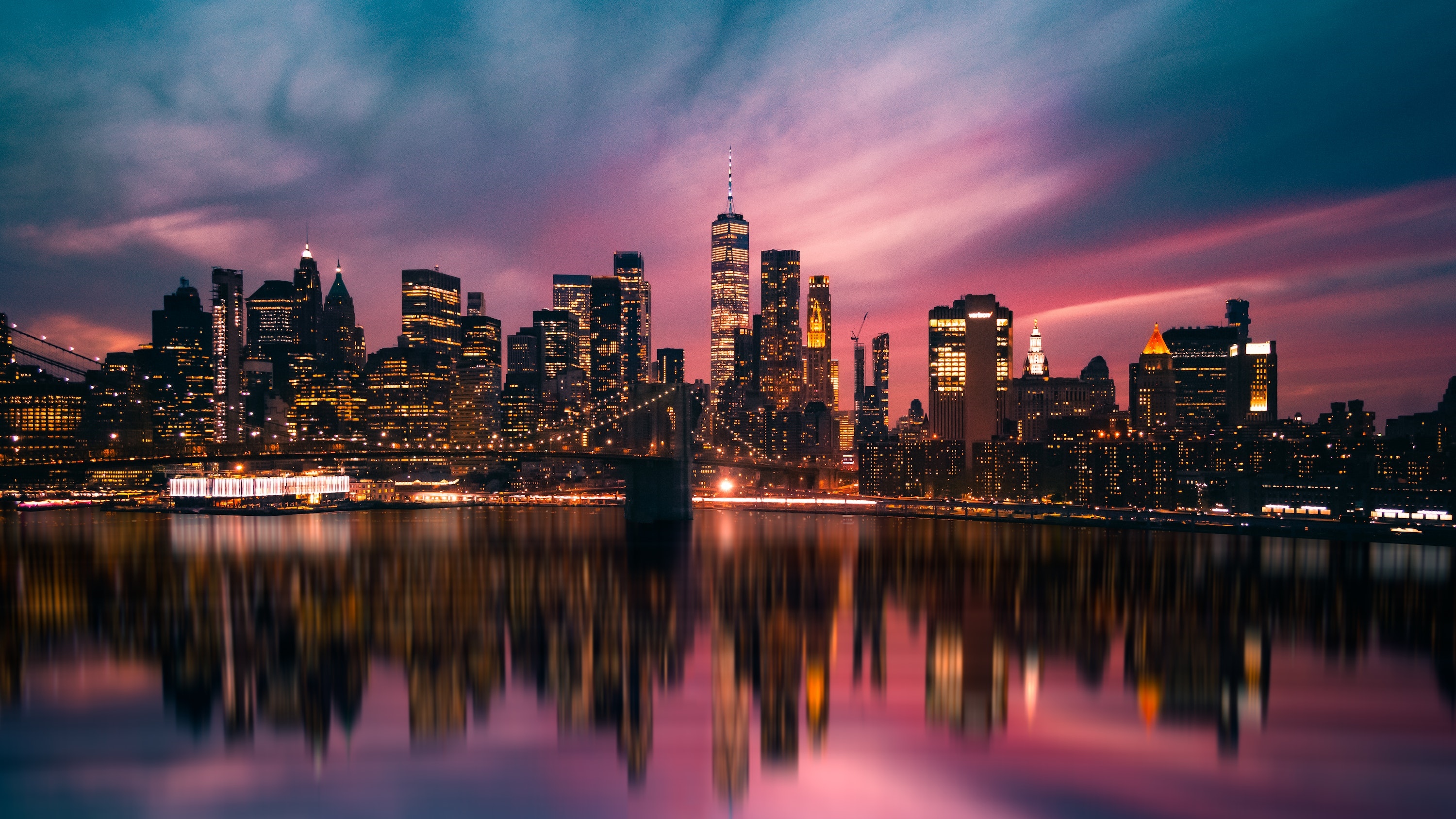 New York City skyline with Brooklyn Bridge at sunset HD Wallpaper