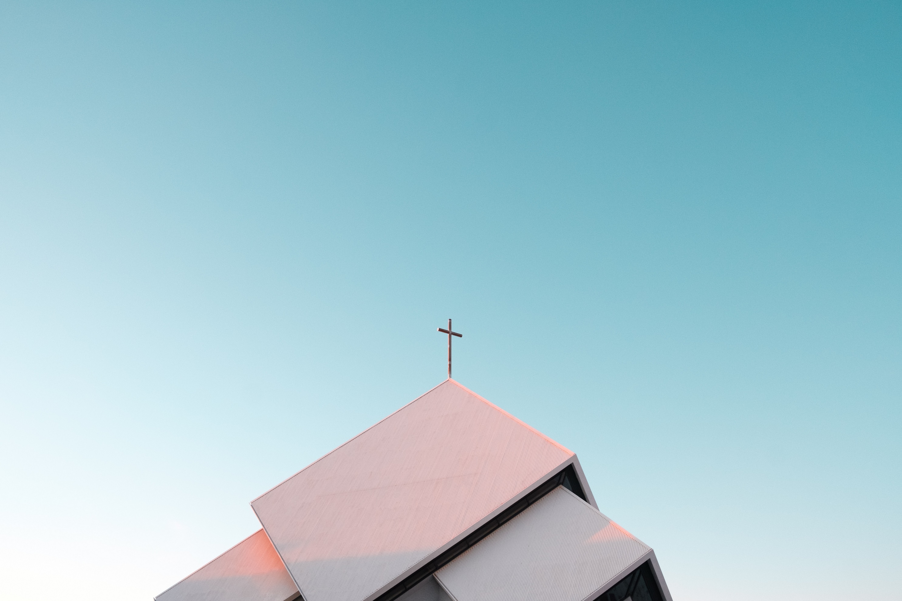Cross on a modern building against a clear sky HD Wallpaper