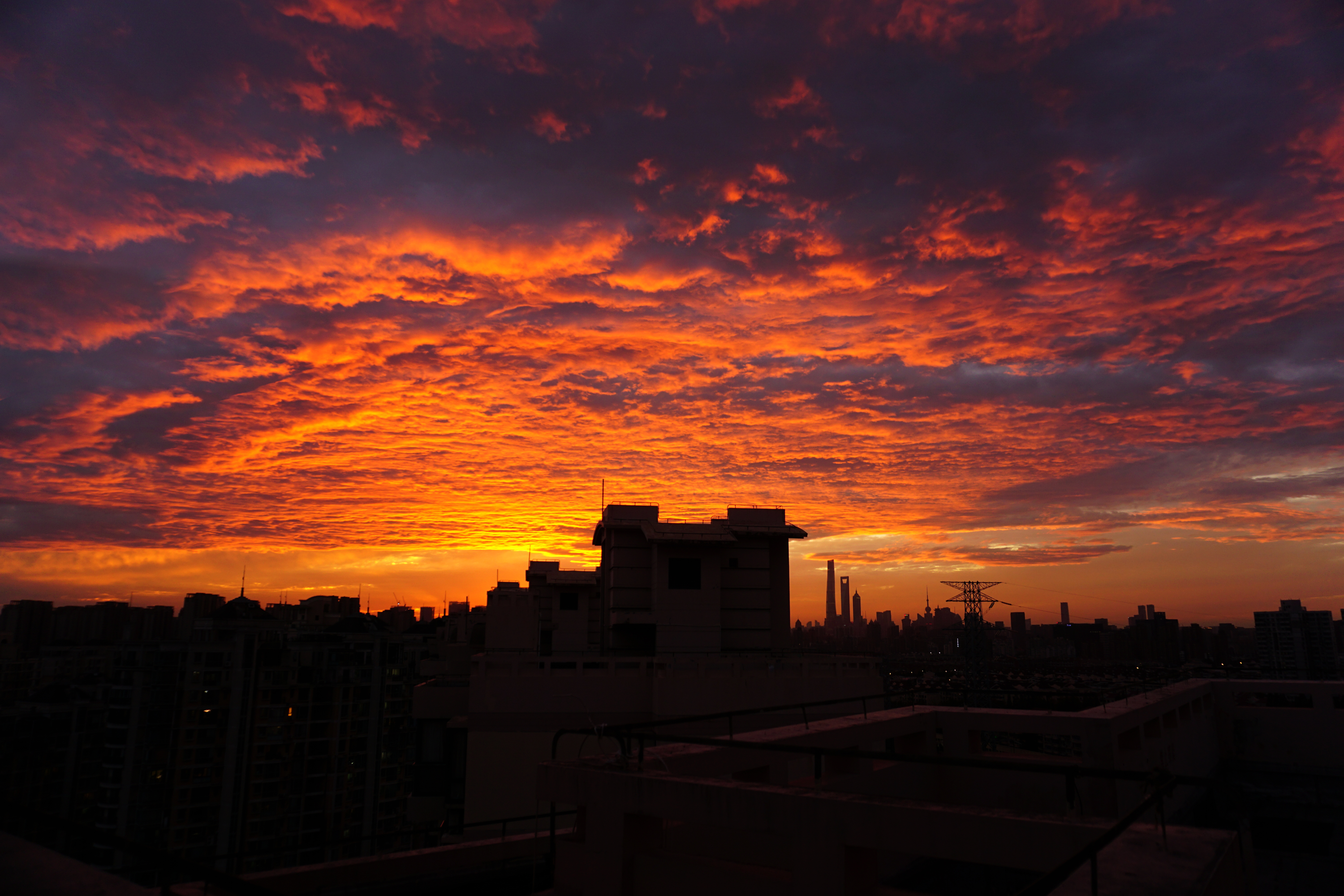 Shanghai skyline at sunset with fiery clouds HD Wallpaper