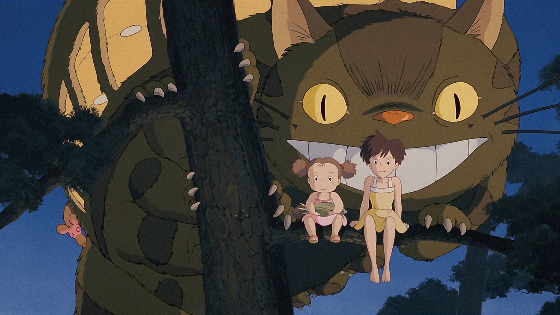 Totoro and two girls sitting on a tree branch HD Wallpaper