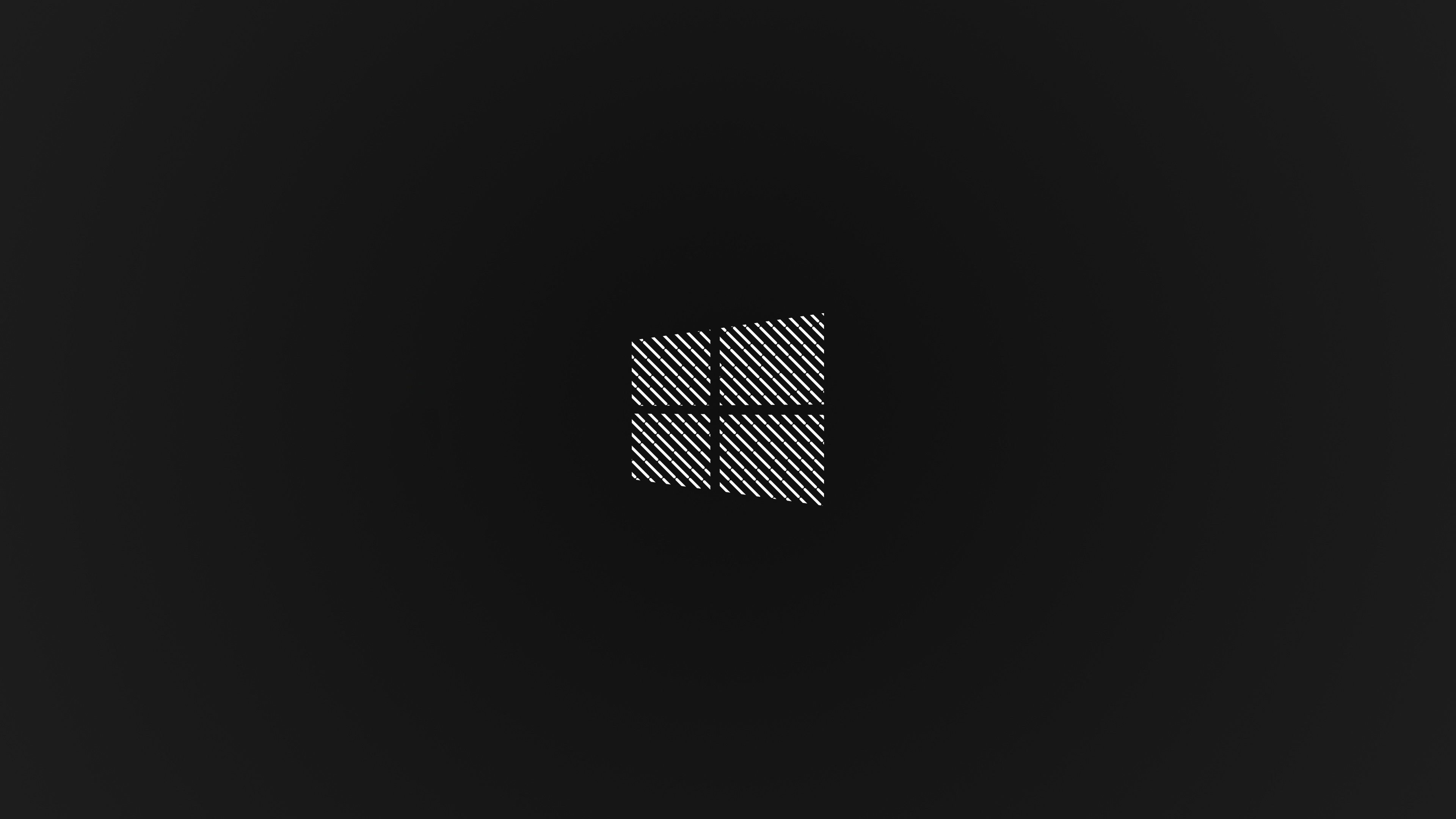 Windows 11 logo on a dark background HD Wallpaper