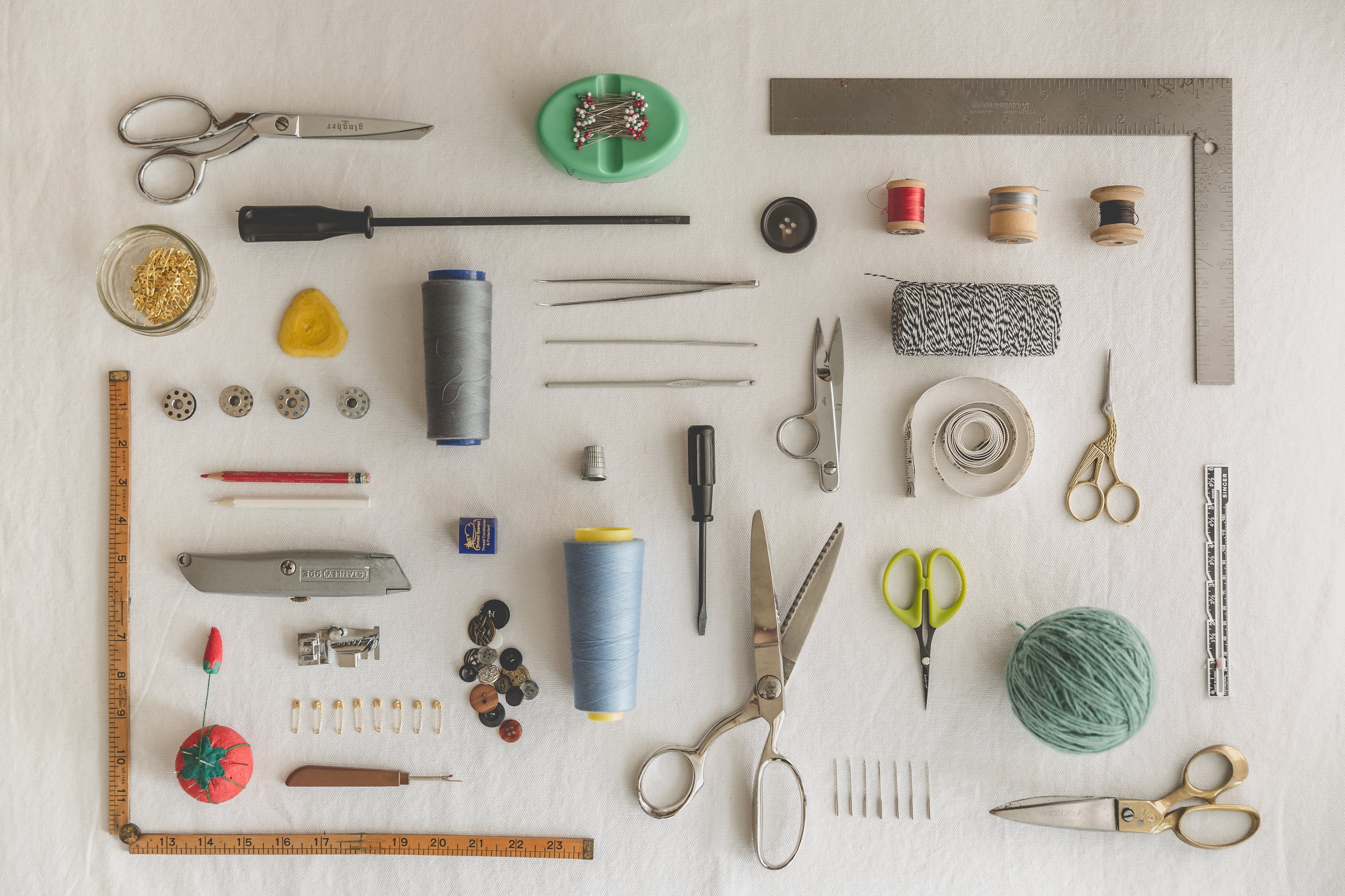 Sewing and crafting tools laid out flat HD Wallpaper