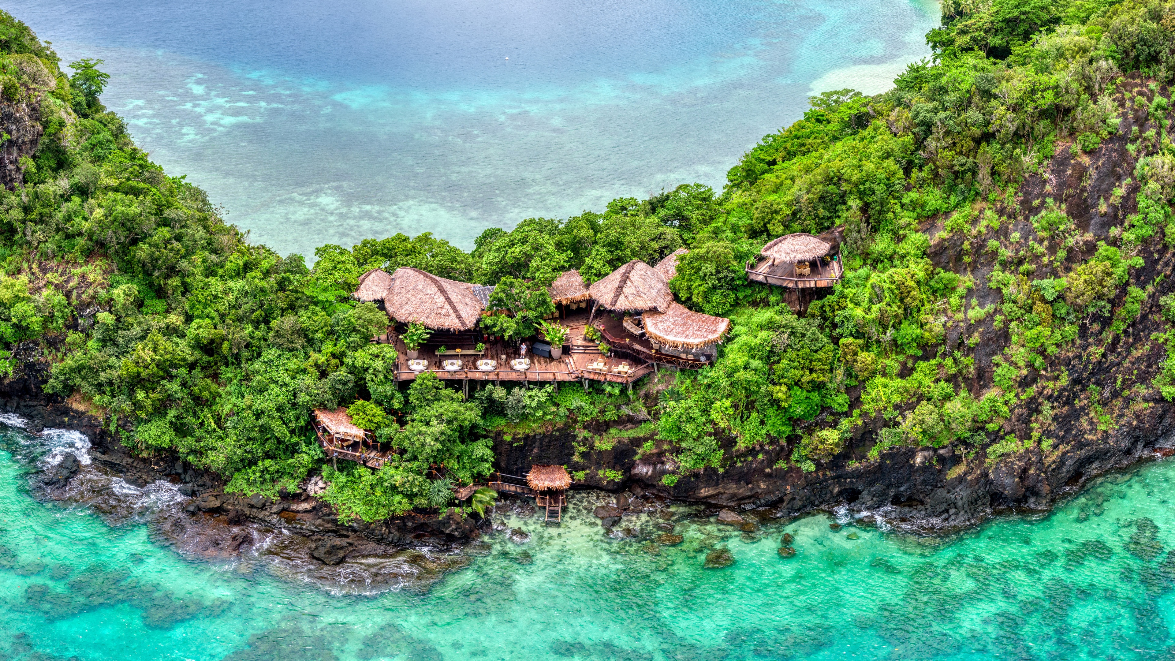 Aerial view of a resort on a tropical island in Fiji HD Wallpaper