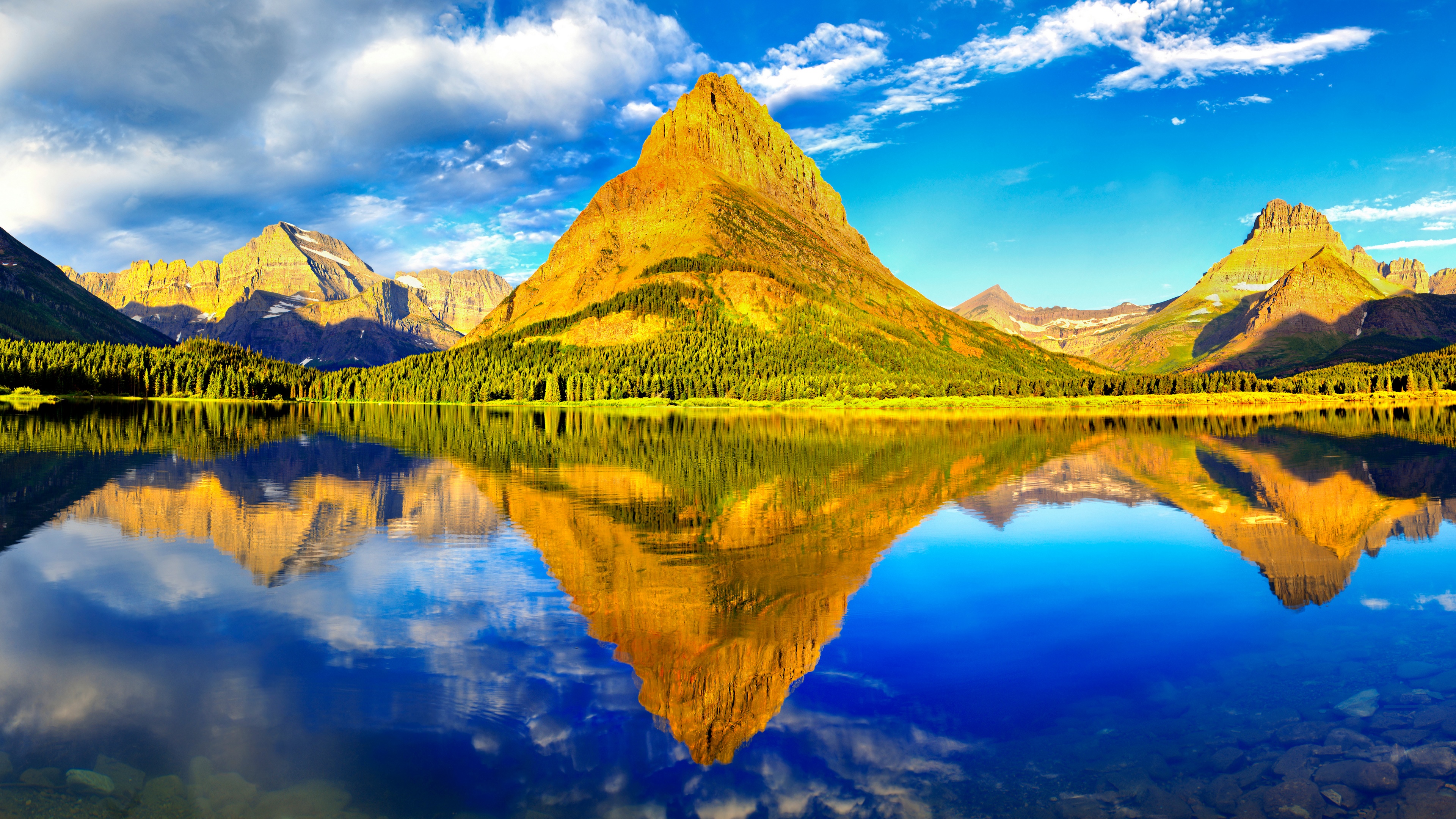 Mountain reflection in a lake at sunrise HD Wallpaper