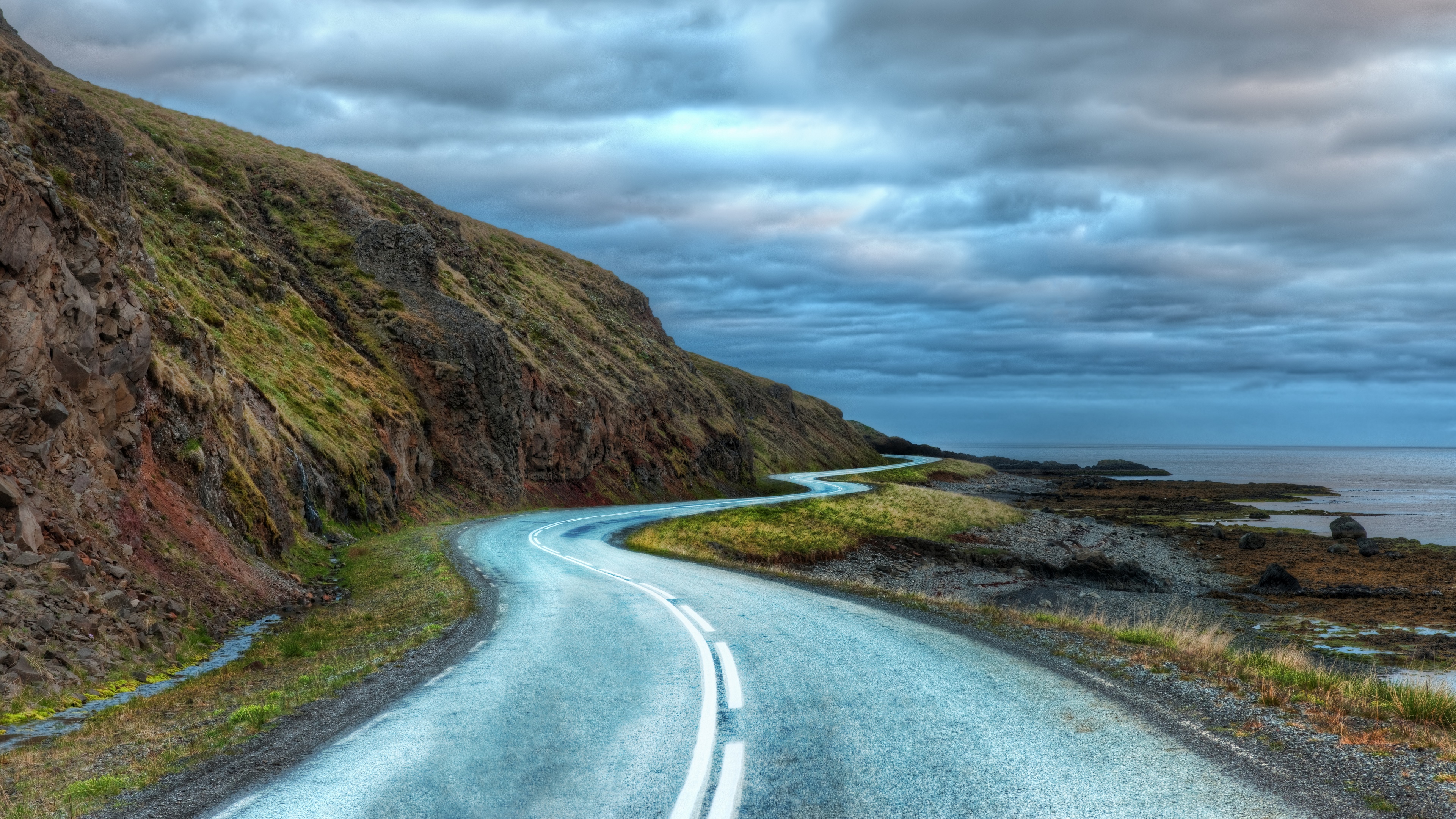 4K Curvy Road Along Iceland's Shoreline HD Wallpaper