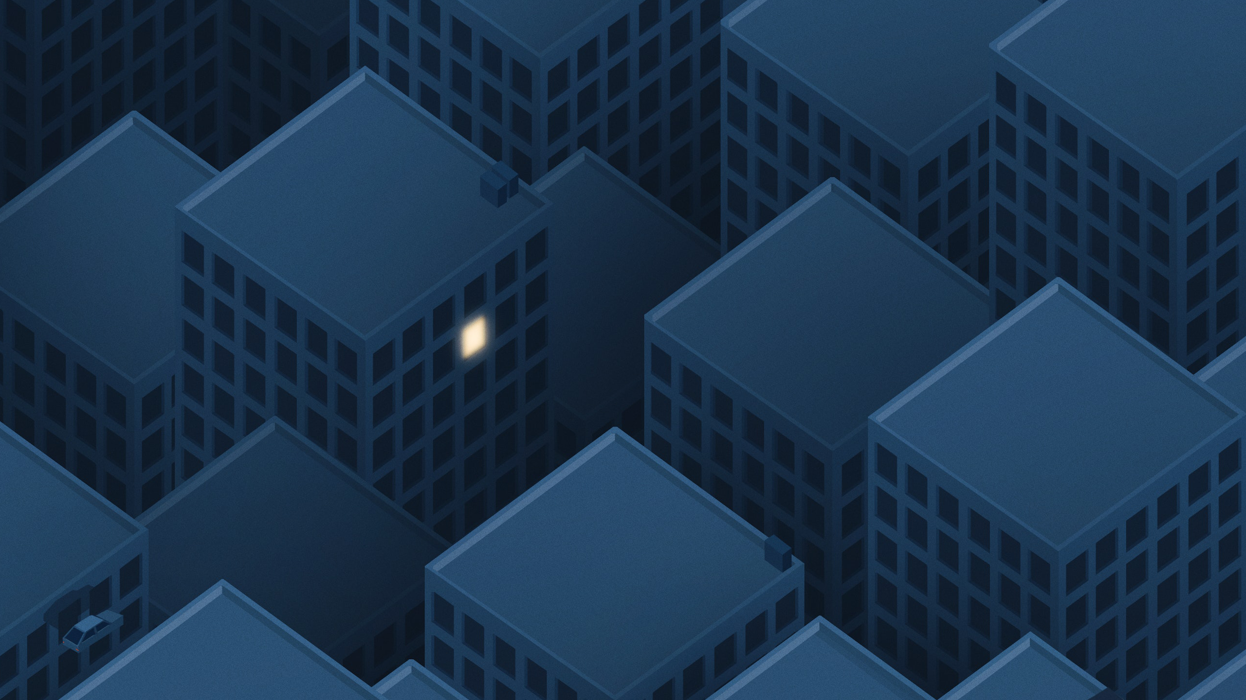 Aerial view of a city at night with one lit building HD Wallpaper