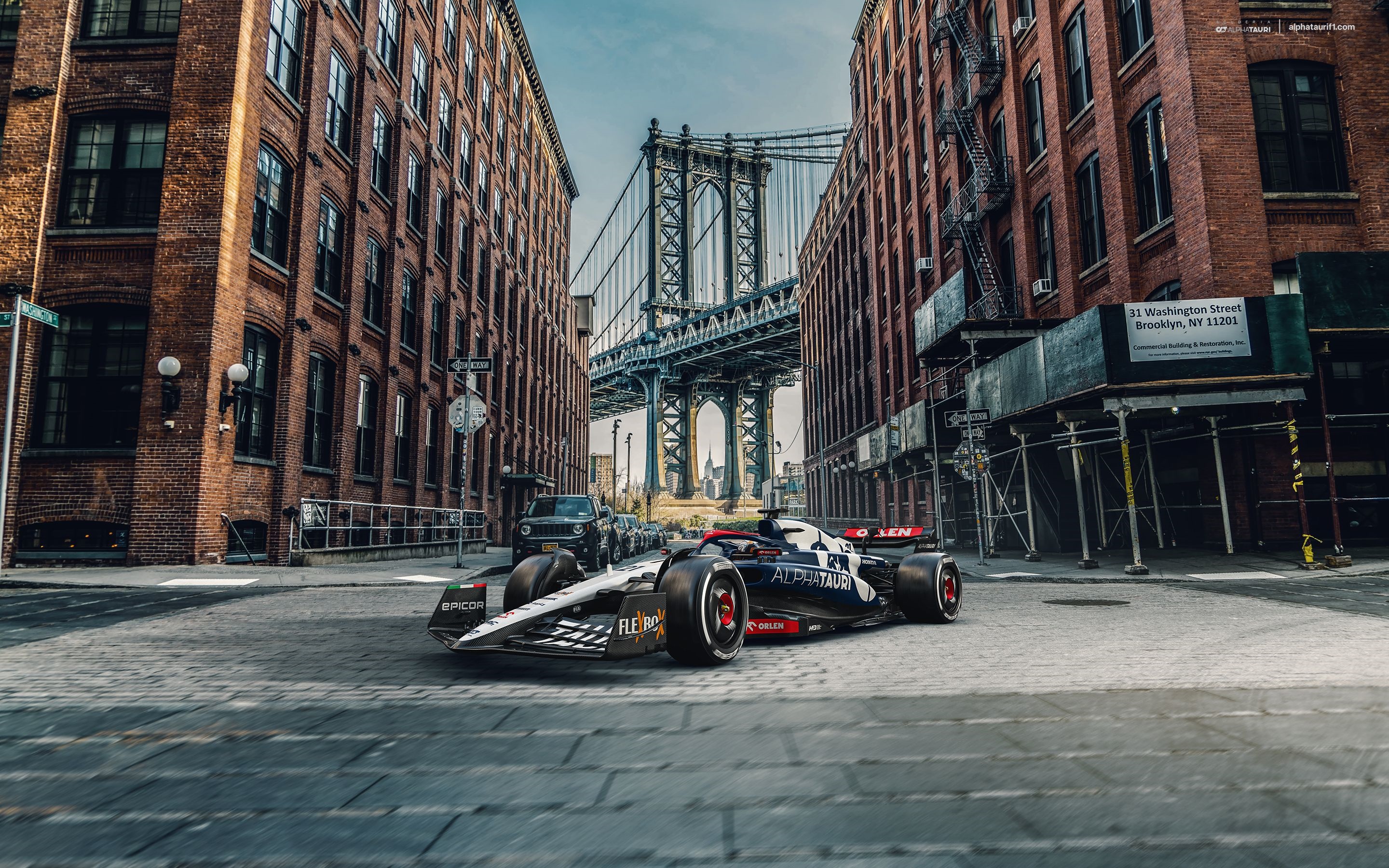 Scuderia AlphaTauri Formula 1 car on Manhattan Bridge street HD Wallpaper