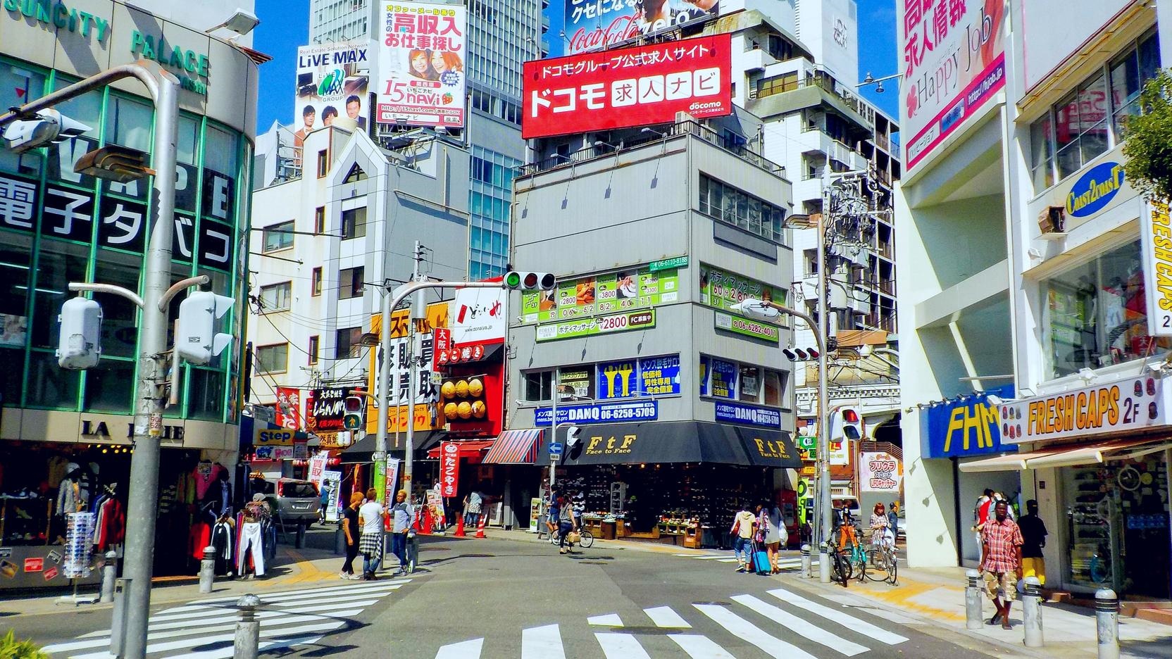 Street Scene in Japan with Billboards and Shops HD Wallpaper