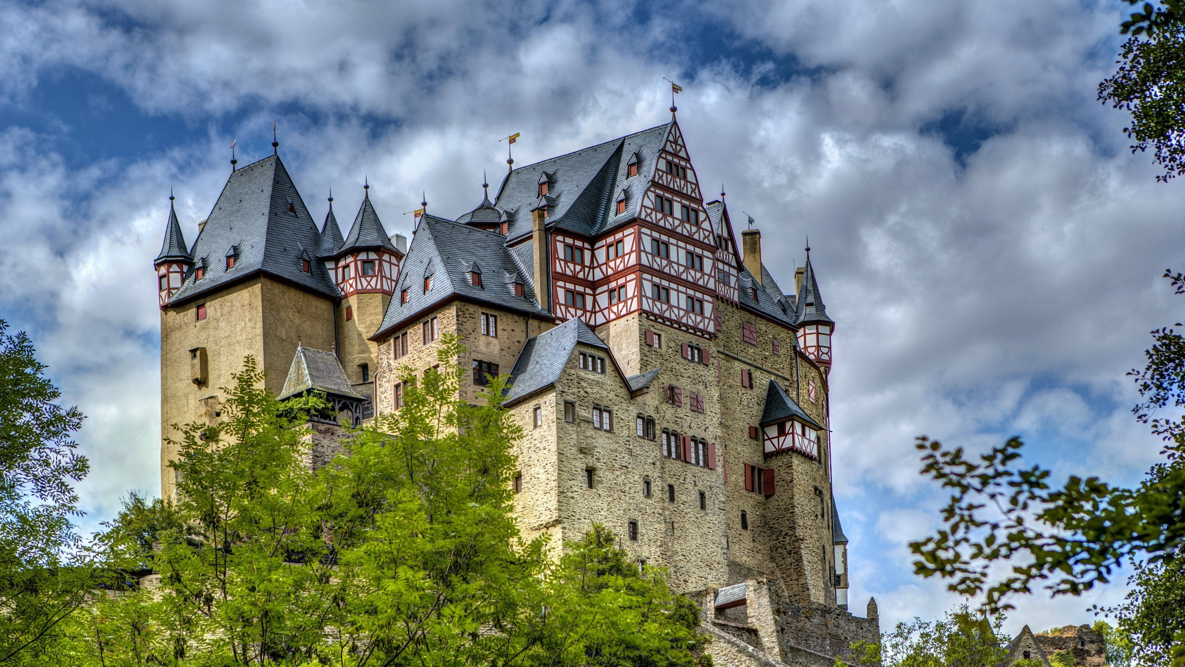 Eltz Castle with Greenery and Clouds HD Wallpaper