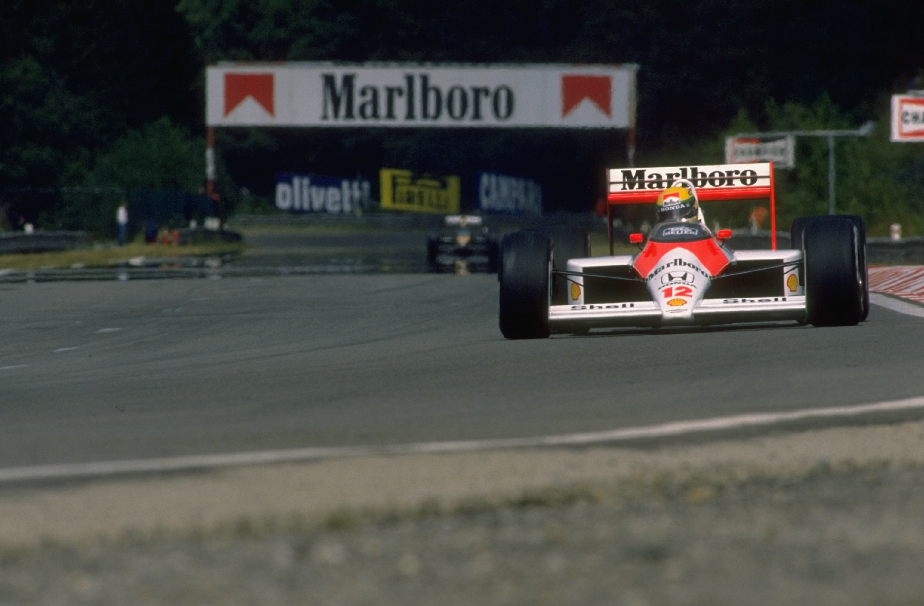 Ayrton Senna driving a McLaren F1 car HD Wallpaper