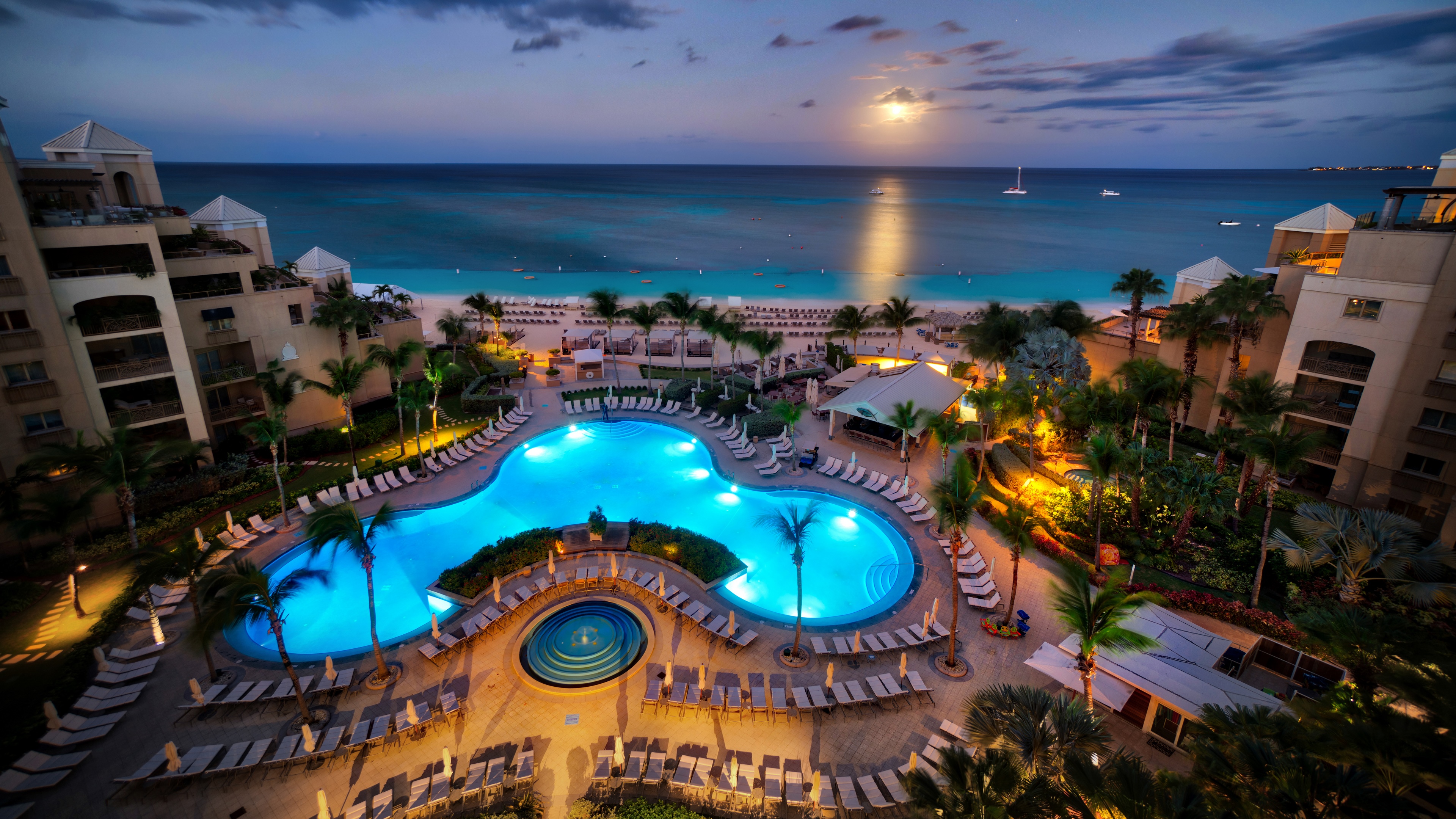 4K Swimming Pool and Beach at Dusk HD Wallpaper